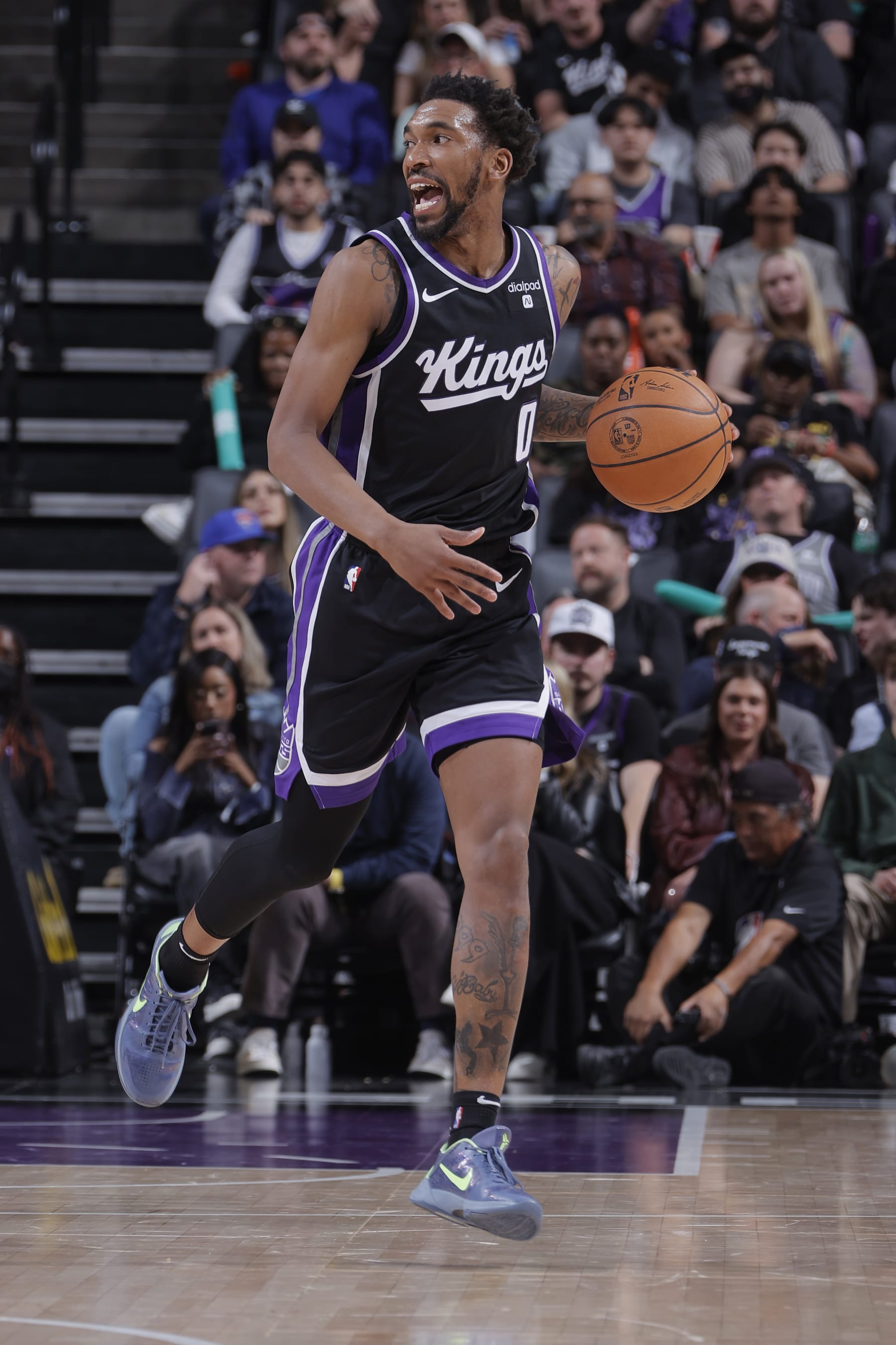 SACRAMENTO, CA - MARCH 25:  Malik Monk #0 of the Sacramento Kings handles the ball during the game  on March 25, 2024 at Golden 1 Center in Sacramento, California. NOTE TO USER: User expressly acknowledges and agrees that, by downloading and or using this Photograph, user is consenting to the terms and conditions of the Getty Images License Agreement. Mandatory Copyright Notice: Copyright 2024 NBAE (Photo by Rocky Widner/NBAE via Getty Images)