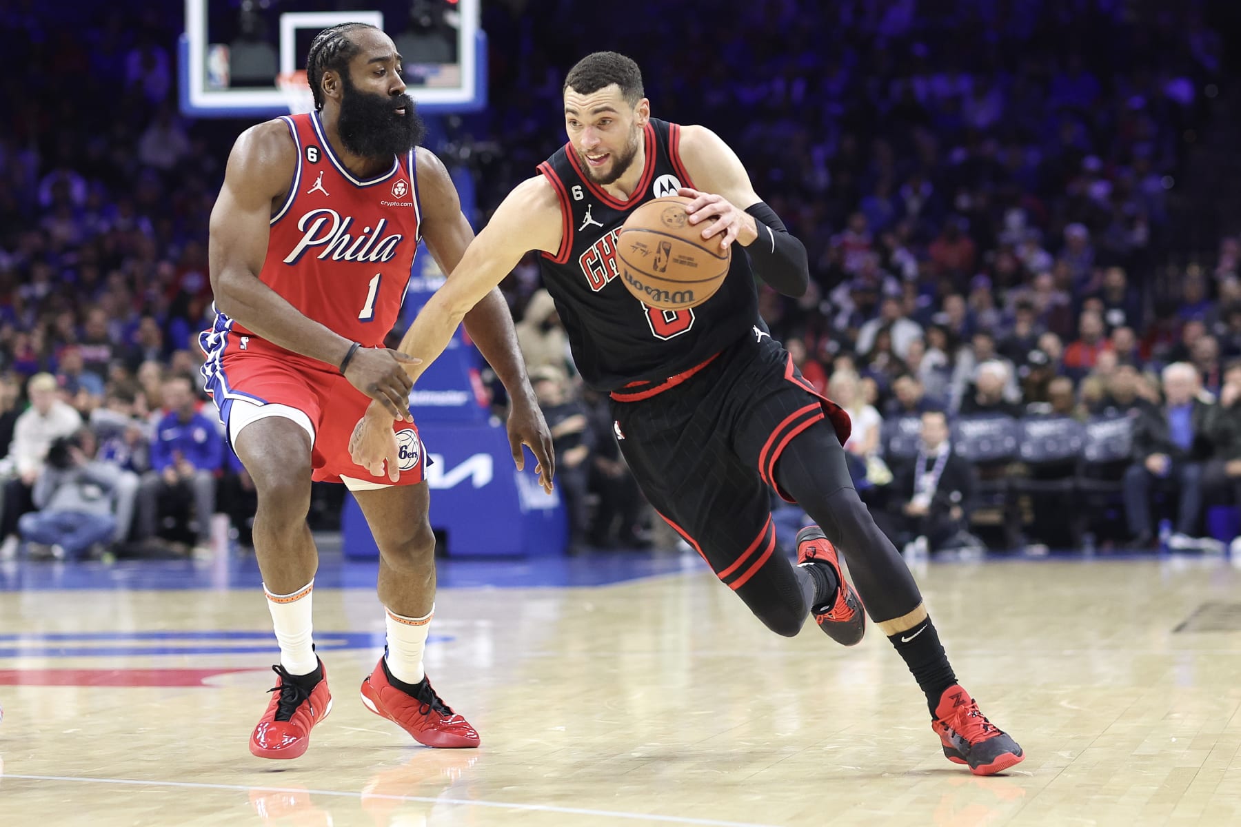 PHILADELPHIA, PENNSYLVANIA - JANUARY 06: Zach LaVine #8 of the Chicago Bulls drives past James Harden #1 of the Philadelphia 76ers during the second quarter at Wells Fargo Center on January 06, 2023 in Philadelphia, Pennsylvania. NOTE TO USER: User expressly acknowledges and agrees that, by downloading and or using this photograph, User is consenting to the terms and conditions of the Getty Images License Agreement. (Photo by Tim Nwachukwu/Getty Images)