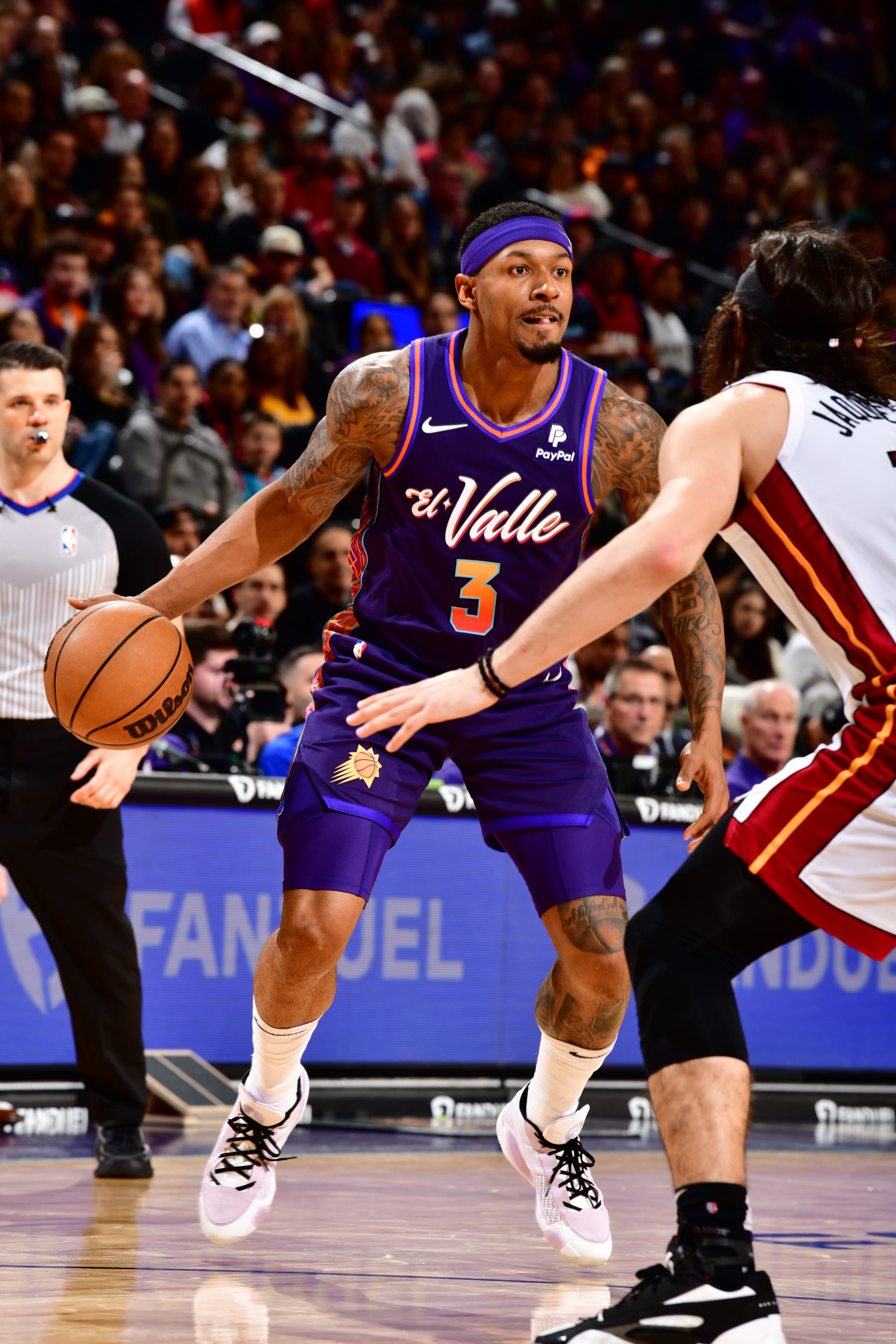 PHOENIX, AZ - JANUARY 5: Bradley Beal #3 of the Phoenix Suns dribbles the ball during the game against the Miami Heat on January 5, 2023 at Footprint Center in Phoenix, Arizona. NOTE TO USER: User expressly acknowledges and agrees that, by downloading and or using this photograph, user is consenting to the terms and conditions of the Getty Images License Agreement. Mandatory Copyright Notice: Copyright 2024 NBAE (Photo by Barry Gossage/NBAE via Getty Images)