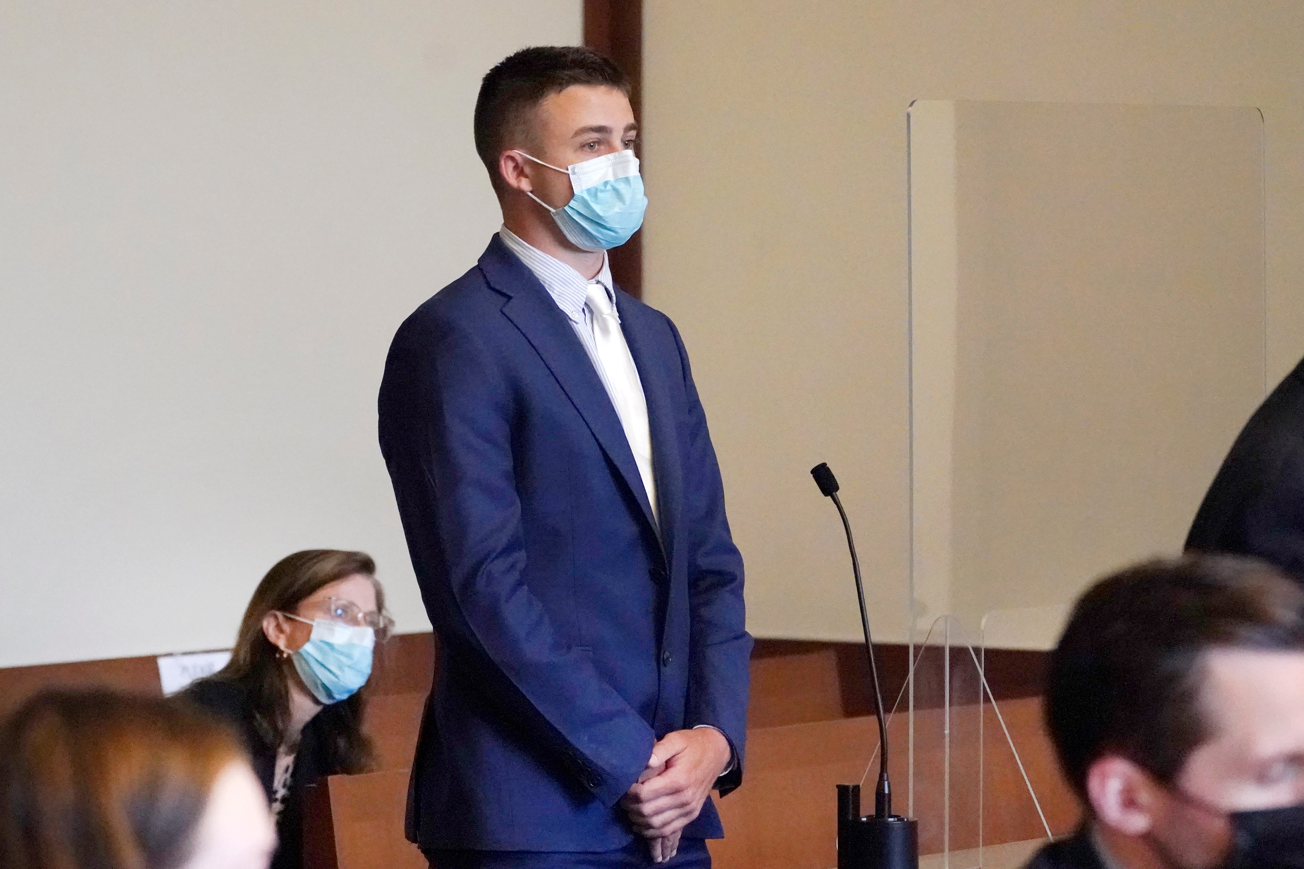 Cole Buckley, 21, of Braintree, Mass. is arraigned, Wednesday, June 2, 2021, in Boston Municipal Court, on charges of assault and battery with a dangerous weapon. Buckley, a Boston Celtics fan, allegedly threw a water bottle at Brooklyn Nets' Kyrie Irving as Irving was leaving the basketball court after defeating the Celtics in Game 4 of their postseason series. Buckley pleaded not guilty. (AP Photo/Elise Amendola, Pool)