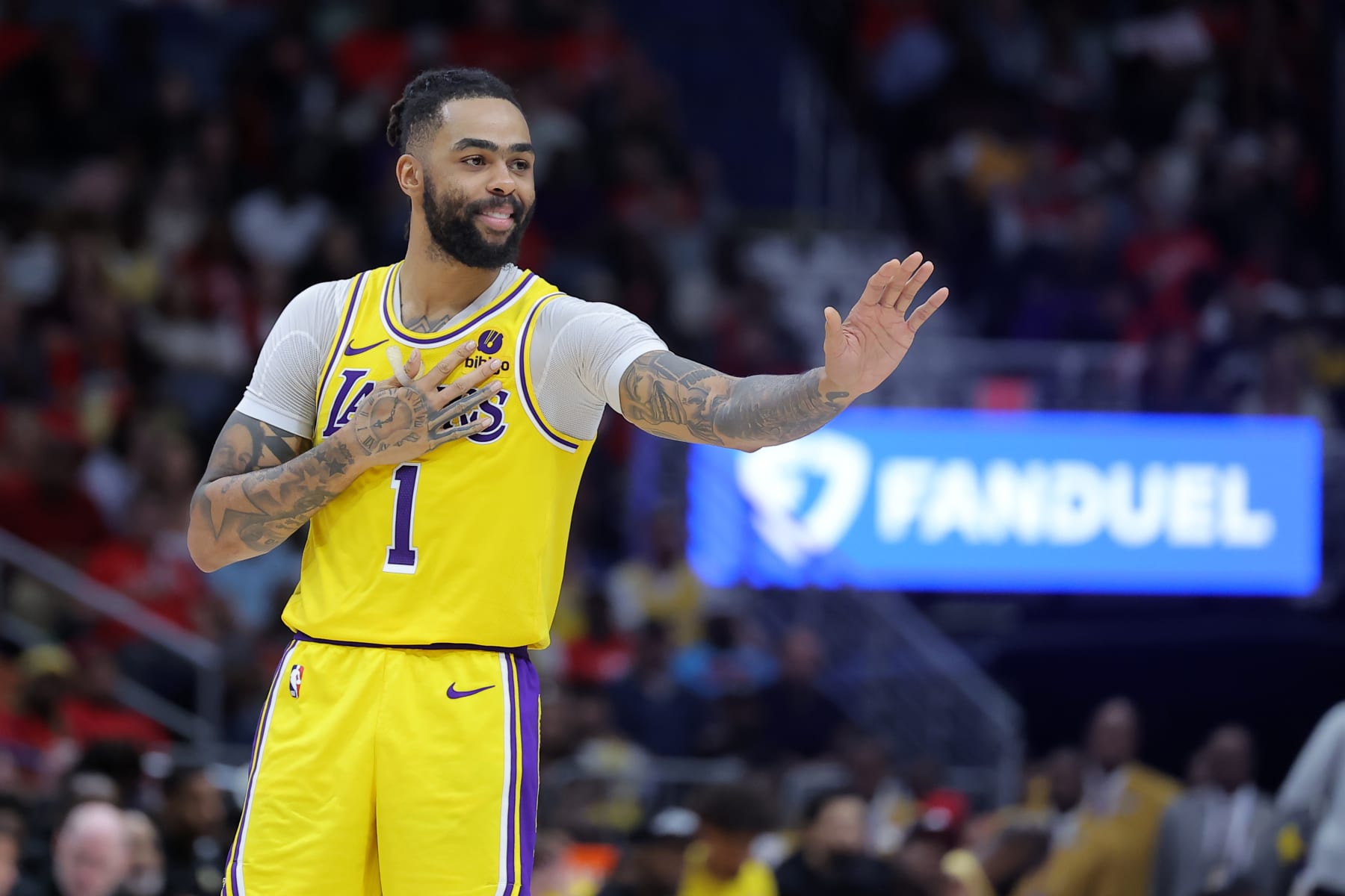 NEW ORLEANS, LOUISIANA - APRIL 16: D'Angelo Russell #1 of the Los Angeles Lakers reacts against the New Orleans Pelicans during a play-in tournament game at the Smoothie King Center on April 16, 2024 in New Orleans, Louisiana. NOTE TO USER: User expressly acknowledges and agrees that, by downloading and or using this Photograph, user is consenting to the terms and conditions of the Getty Images License Agreement. (Photo by Jonathan Bachman/Getty Images)