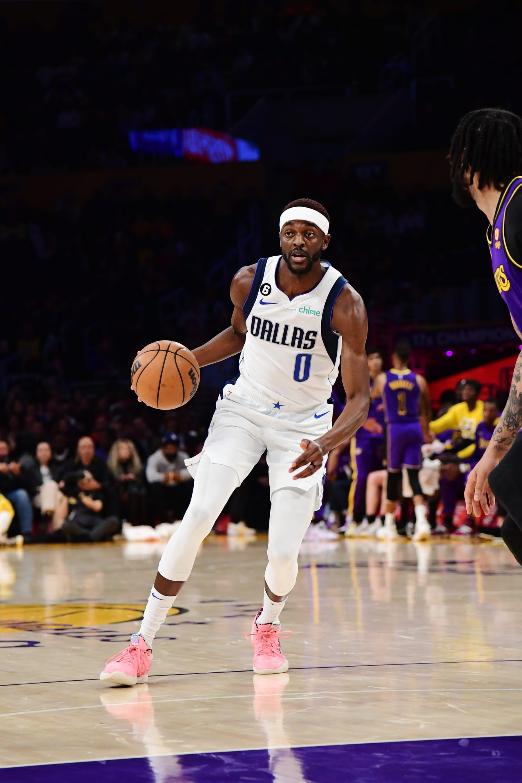LOS ANGELES, CA -MARCH 17: Justin Holiday #0 of the Dallas Mavericks dribbles the ball during the game against the Los Angeles Lakers on March 17, 2023 at Crypto.Com Arena in Los Angeles, California. NOTE TO USER: User expressly acknowledges and agrees that, by downloading and/or using this Photograph, user is consenting to the terms and conditions of the Getty Images License Agreement. Mandatory Copyright Notice: Copyright 2023 NBAE (Photo by Adam Pantozzi/NBAE via Getty Images)