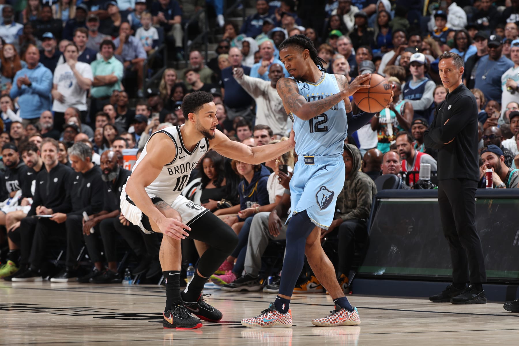 MEMPHIS, TN - OCTOBER 24: Ben Simmons #10 of the Brooklyn Nets plays defense on Ja Morant #12 of the Memphis Grizzlies during the game on October 24, 2022 at FedExForum in Memphis, Tennessee. NOTE TO USER: User expressly acknowledges and agrees that, by downloading and or using this photograph, User is consenting to the terms and conditions of the Getty Images License Agreement. Mandatory Copyright Notice: Copyright 2022 NBAE (Photo by Joe Murphy/NBAE via Getty Images)