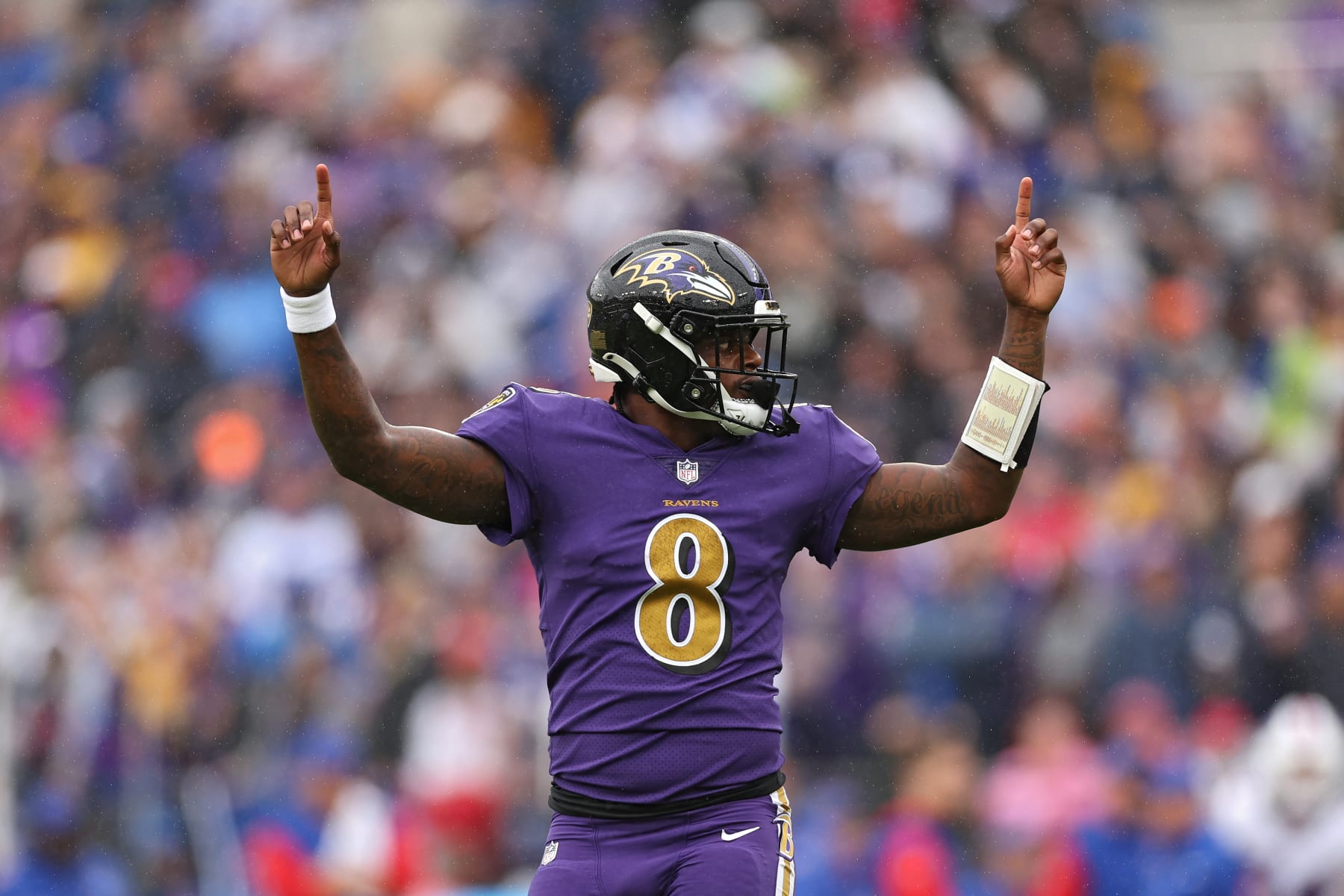 BALTIMORE, MARYLAND - OCTOBER 02: Quarterback Lamar Jackson #8 of the Baltimore Ravens celebrates after teammate J.K. Dobbins #27 scored a touchdown in the first quarter against the Buffalo Bills at M&T Bank Stadium on October 02, 2022 in Baltimore, Maryland. (Photo by Patrick Smith/Getty Images)