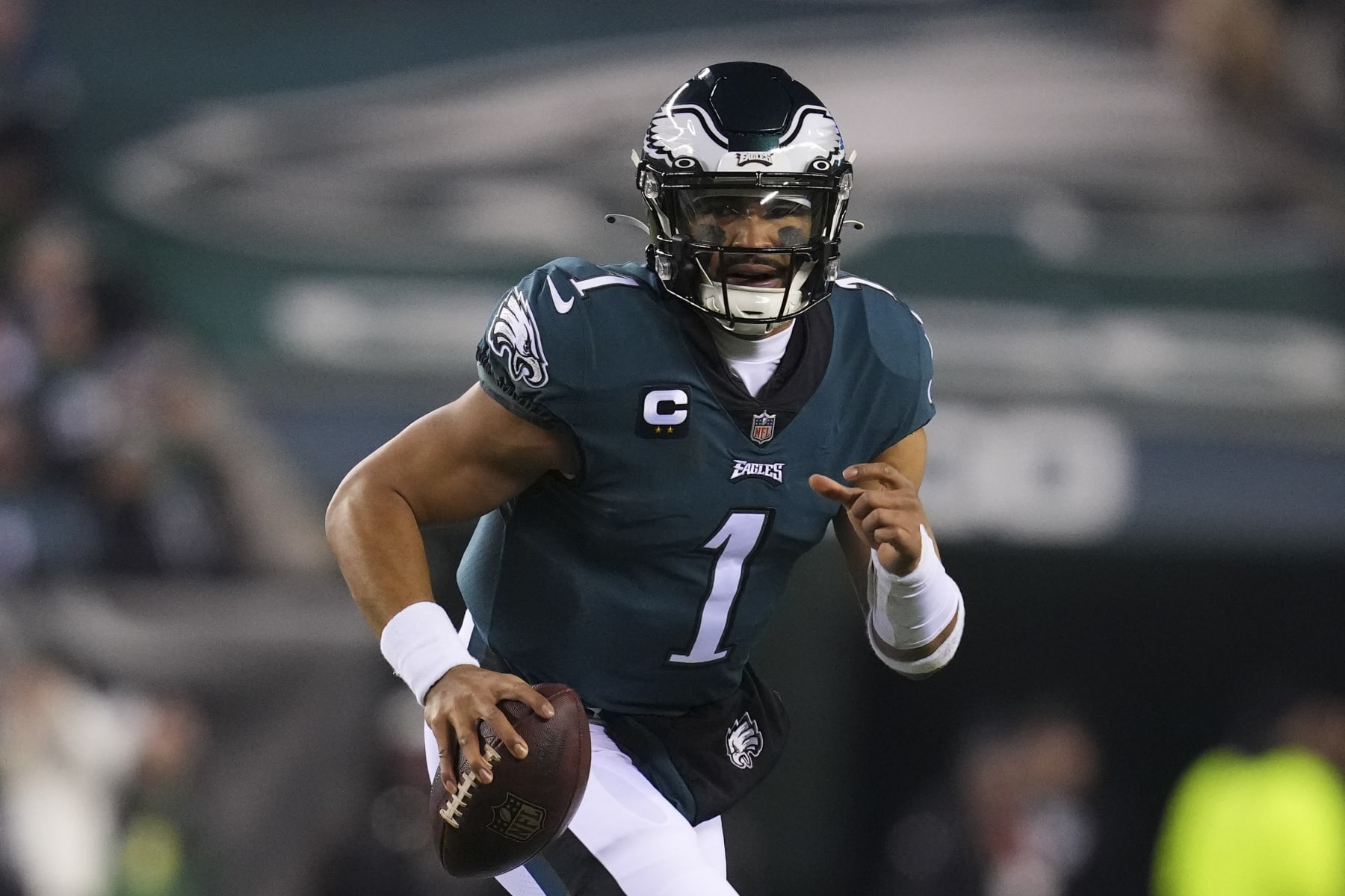 PHILADELPHIA, PA - JANUARY 21: Jalen Hurts #1 of the Philadelphia Eagles runs with the ball against the New York Giants during the NFC Divisional Playoff game at Lincoln Financial Field on January 21, 2023 in Philadelphia, Pennsylvania. (Photo by Mitchell Leff/Getty Images)