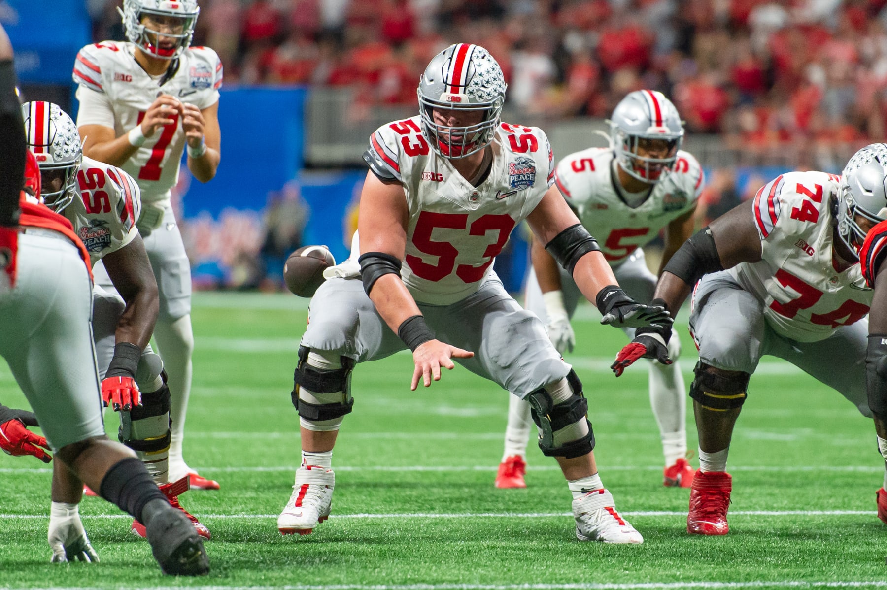 ATLANTA, GA - DECEMBER 31: Ohio State Buckeyes offensive lineman Luke Wypler (53) during the Chick-fil-A Peach Bowl College Football Playoff Semifinal game between the Ohio State Buckeyes and the Georgia Bulldogs on December 31, 2022, at Mercedes-Benz Stadium in Atlanta, Georgia.  (Photo by John Adams/Icon Sportswire via Getty Images)