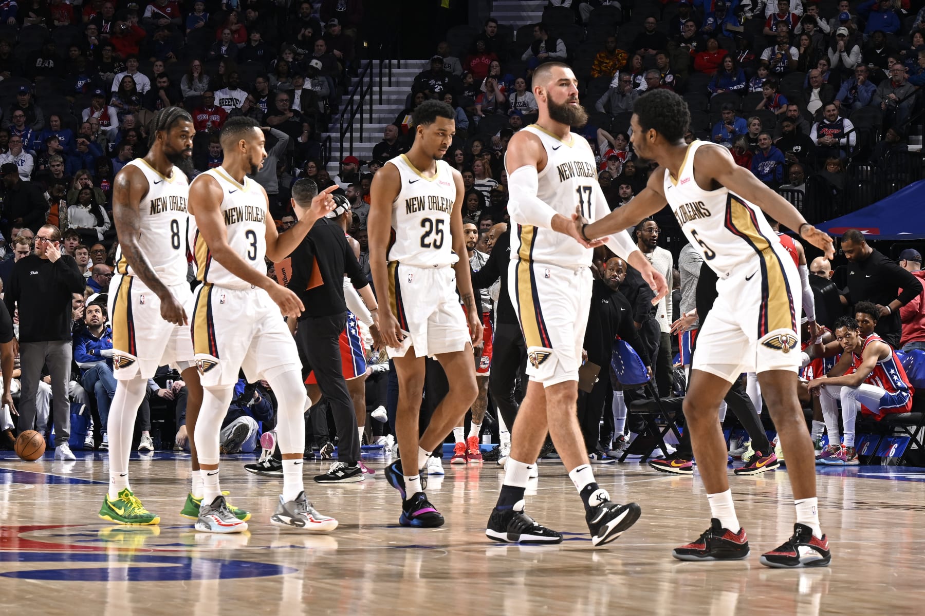 PHILADELPHIA, PA - MARCH 8:  Jonas Valanciunas #17 of the New Orleans Pelicans is congratulated by Herb Jones #5 during the game against the Philadelphia 76ers on March 8, 2024 at the Wells Fargo Center in Philadelphia, Pennsylvania NOTE TO USER: User expressly acknowledges and agrees that, by downloading and/or using this Photograph, user is consenting to the terms and conditions of the Getty Images License Agreement. Mandatory Copyright Notice: Copyright 2024 NBAE (Photo by David Dow/NBAE via Getty Images)