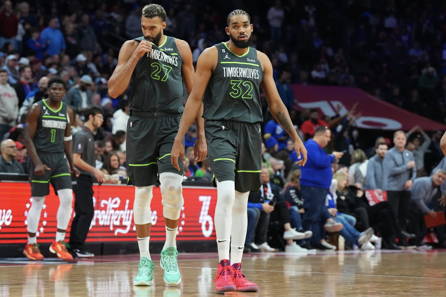 PHILADELPHIA, PA - NOVEMBER 19: Anthony Edwards #1, Rudy Gobert #27, and Karl-Anthony Towns #32 of the Minnesota Timberwolves look on against the Philadelphia 76ers at the Wells Fargo Center on November 19, 2022 in Philadelphia, Pennsylvania. NOTE TO USER: User expressly acknowledges and agrees that, by downloading and or using this photograph, User is consenting to the terms and conditions of the Getty Images License Agreement. (Photo by Mitchell Leff/Getty Images)