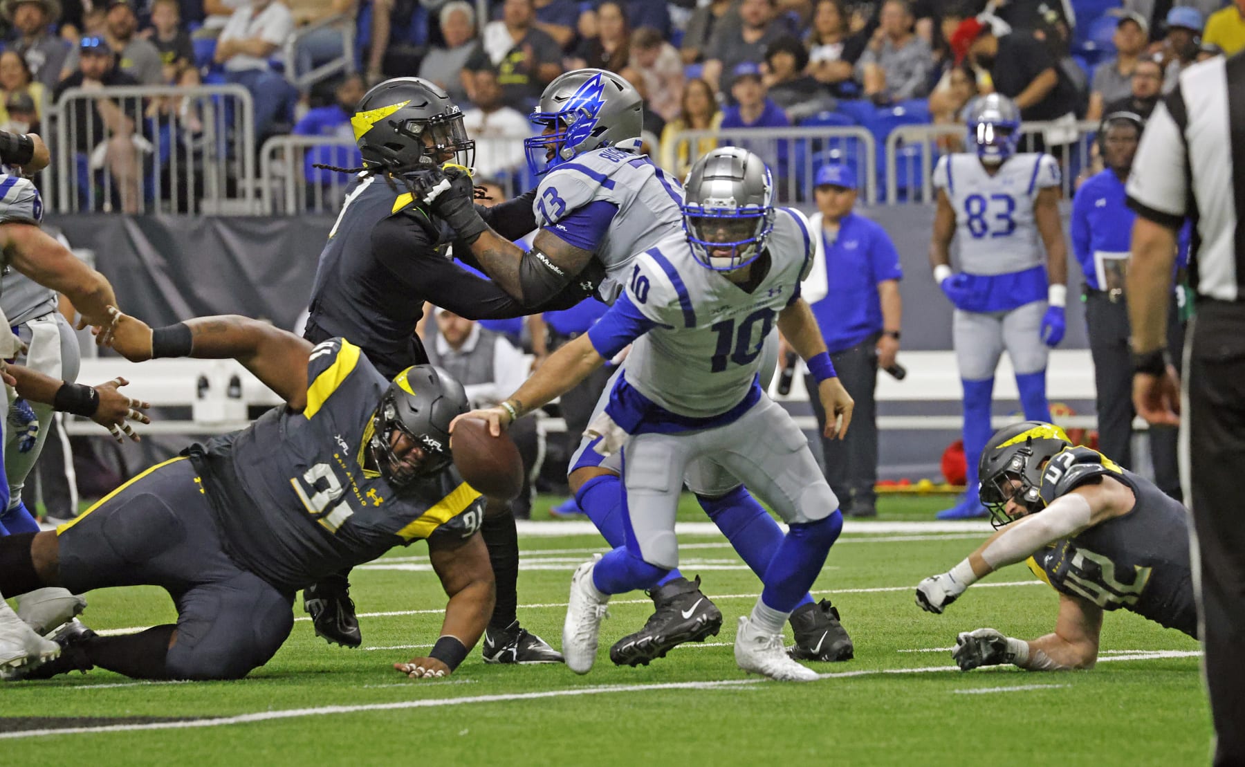 SAN ANTONIO, TX - FEBRUARY 19: A.J. McCarron #10 of the St. Louis Battlehawks scrambles against of the San Antonio Brahamas at the Alamodome on February 19, 2023 in San Antonio, Texas.  (Photo by Ronald Cortes/Getty Images)