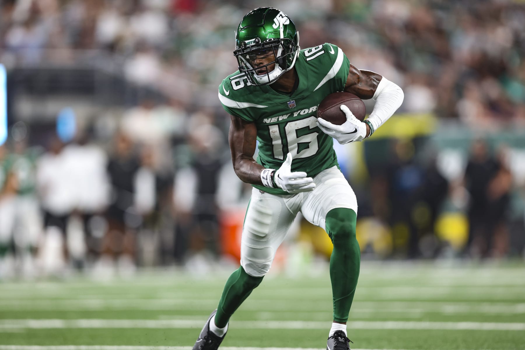 EAST RUTHERFORD, NJ - AUGUST 19: Jason Brownlee #16 of the New York Jets runs the ball against the Tampa Bay Buccaneers during the second half at MetLife Stadium on Saturday, August 19, 2023, in East Rutherford, New Jersey. (Perry Knotts/Getty Images)