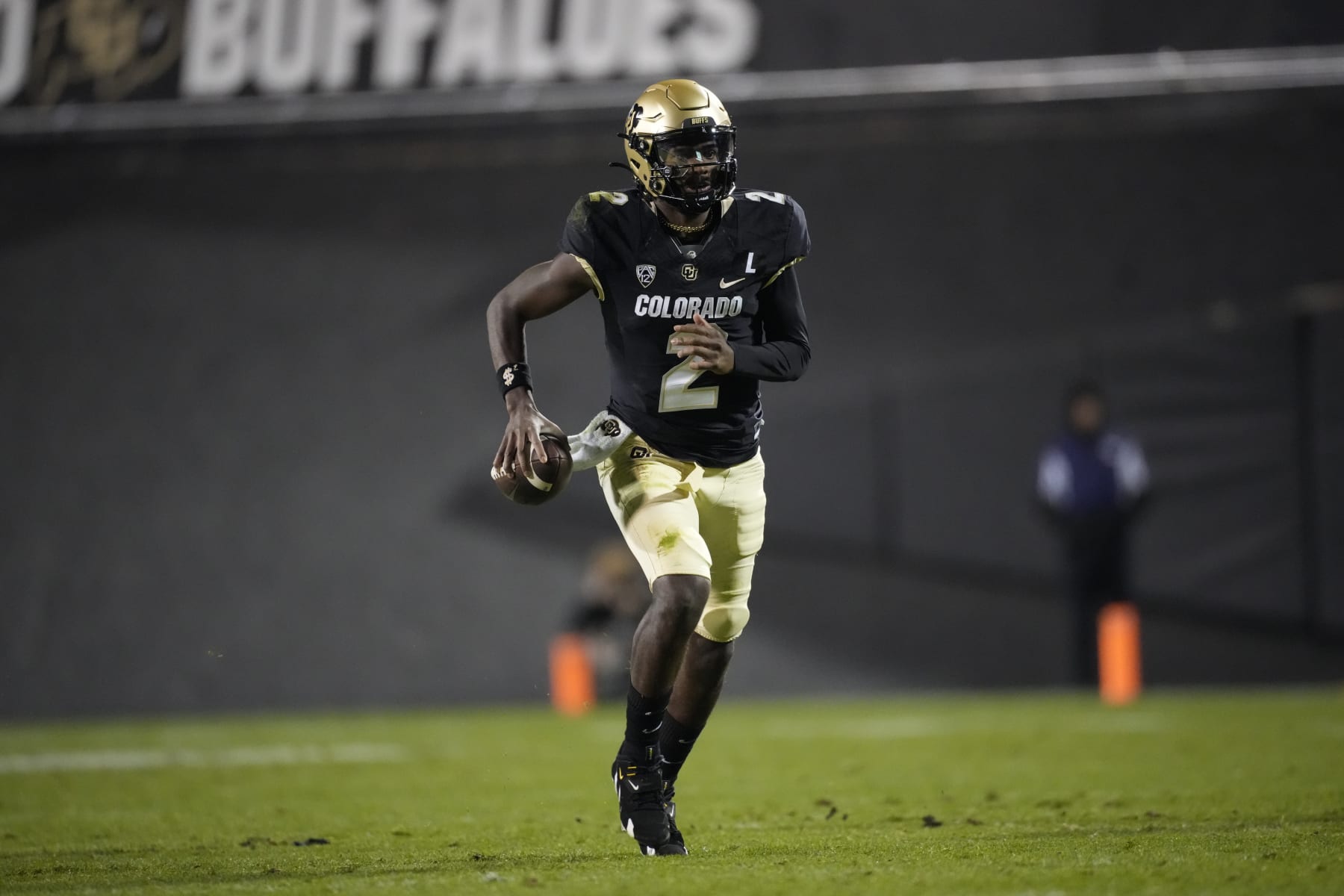 Colorado quarterback Shedeur Sanders (2) in the first half of an NCAA college football game Friday, Oct. 13, 2023, in Boulder, Colo. (AP Photo/David Zalubowski)