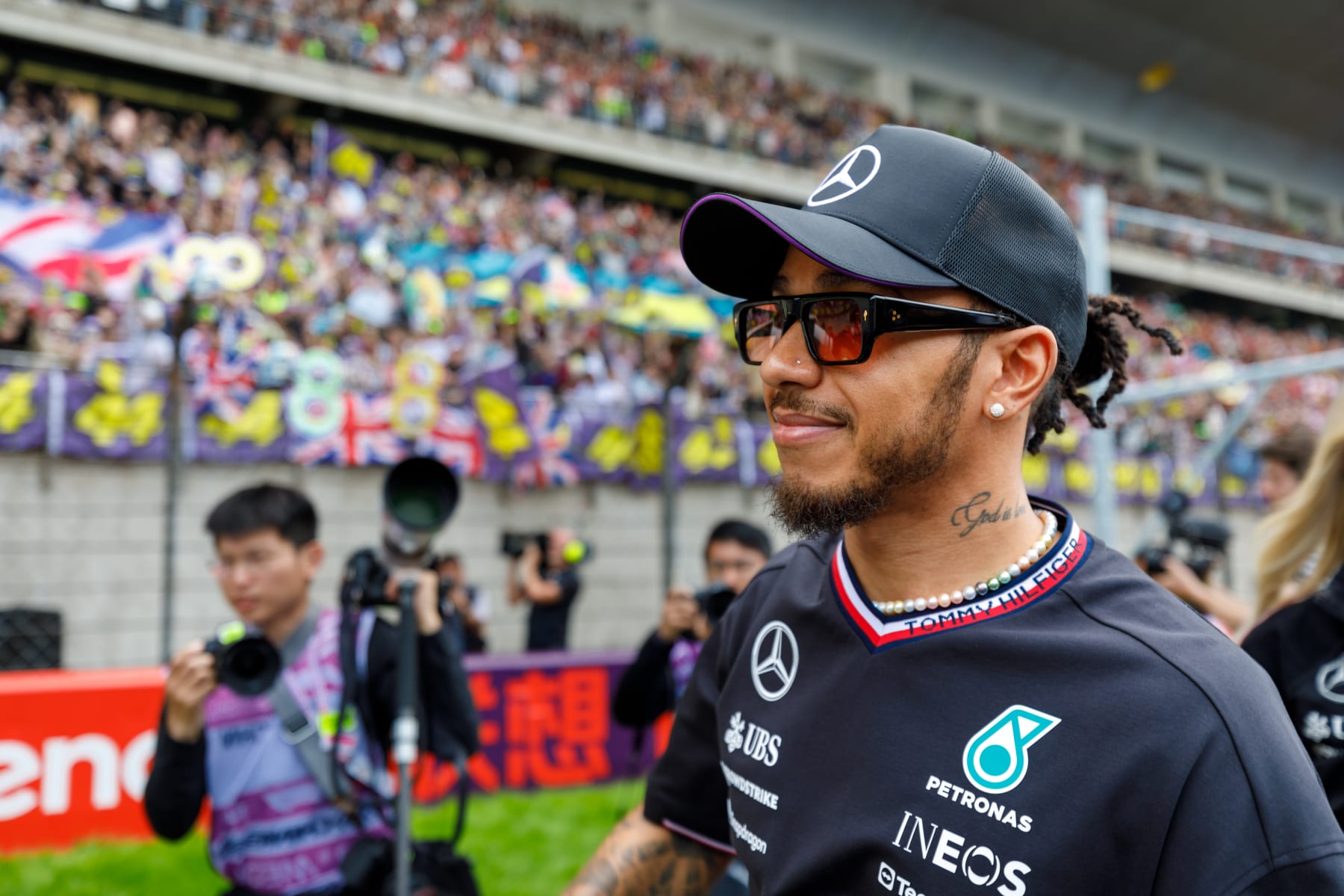 SHANGHAI, CHINA - APRIL 21: British racing driver Lewis Hamilton receives an interview and interacts with supporters during the 2024 F1 Chinese Grand Prix at the Shanghai International Circuit on April 21, 2024 in Shanghai, China. (Photo by VCG/VCG via Getty Images)
