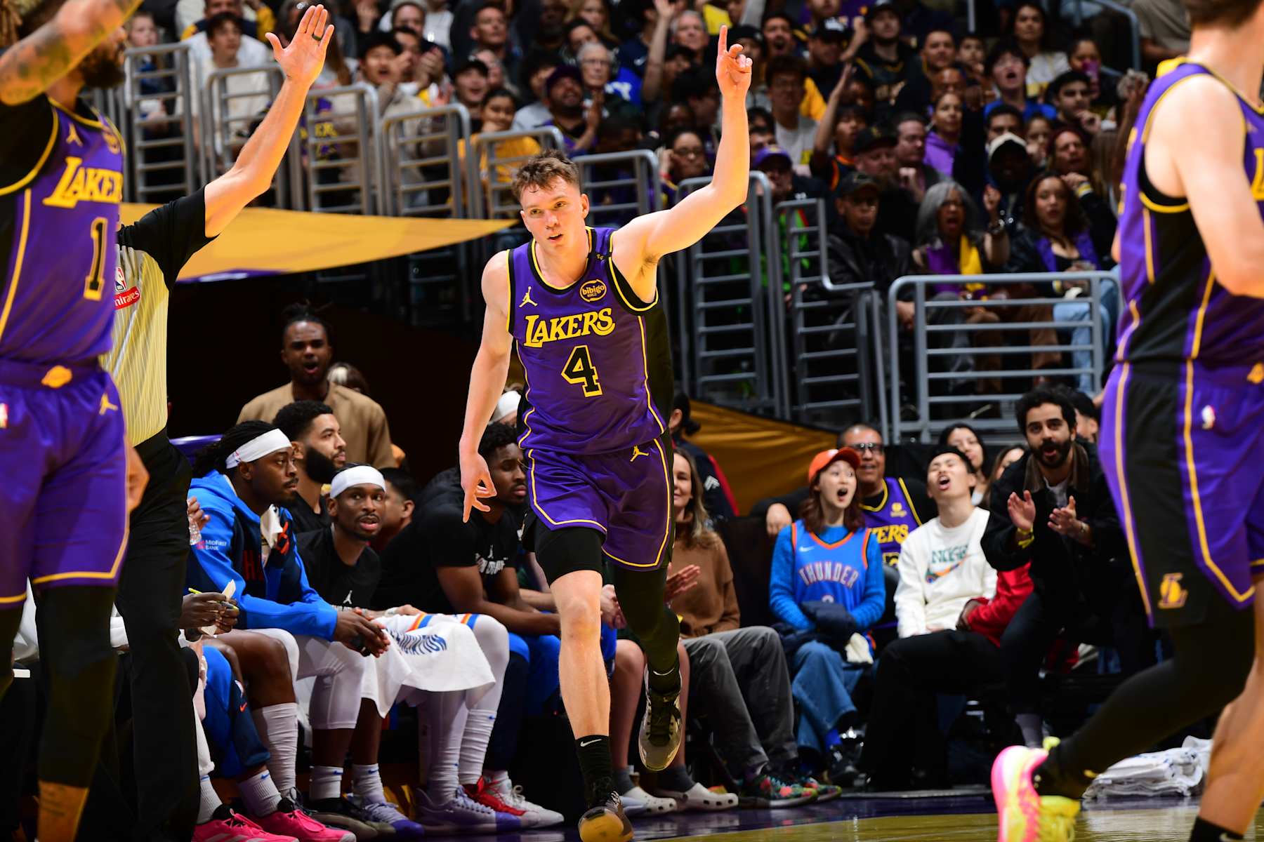 LOS ANGELES, CA - NOVEMBER 29: Dalton Knecht #4 of the Los Angeles Lakers celebrates during the game against the Oklahoma City Thunder during a Emirates NBA Cup game on October 22, 2024 at Crypto.Com Arena in Los Angeles, California. NOTE TO USER: User expressly acknowledges and agrees that, by downloading and/or using this Photograph, user is consenting to the terms and conditions of the Getty Images License Agreement. Mandatory Copyright Notice: Copyright 2024 NBAE (Photo by Adam Pantozzi/NBAE via Getty Images)