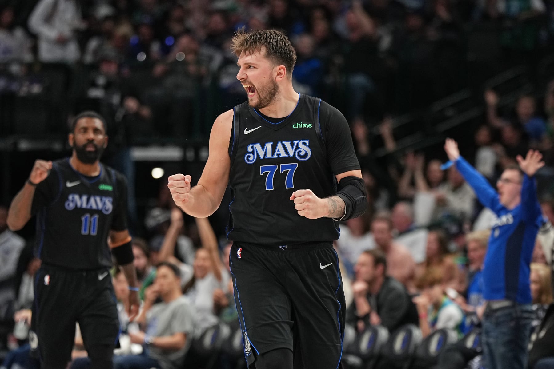 DALLAS, TX - FEBRUARY 22: Luka Doncic #77 of the Dallas Mavericks celebrates during the game against the Phoenix Suns on February 22, 2024 at the American Airlines Center in Dallas, Texas. NOTE TO USER: User expressly acknowledges and agrees that, by downloading and or using this photograph, User is consenting to the terms and conditions of the Getty Images License Agreement. Mandatory Copyright Notice: Copyright 2024 NBAE (Photo by Glenn James/NBAE via Getty Images)