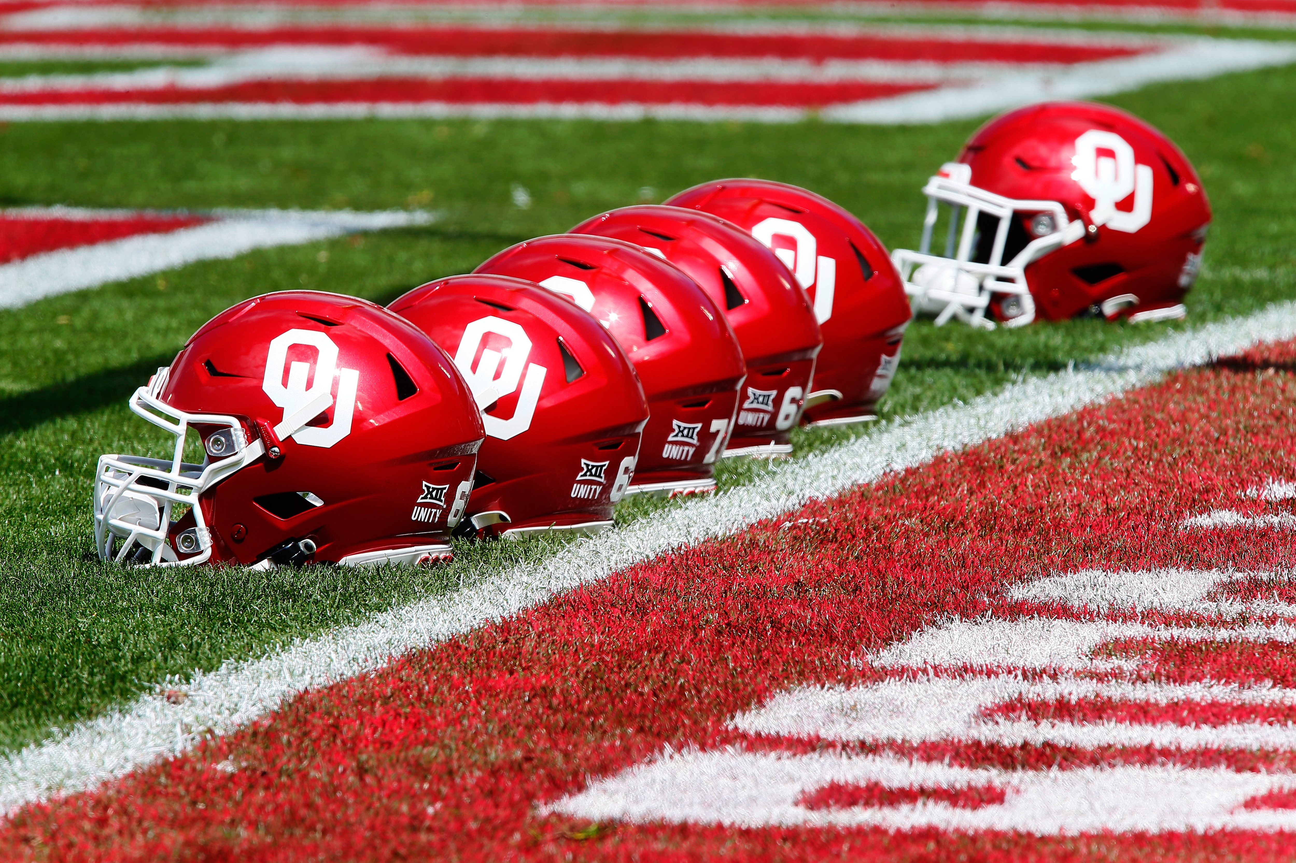 NORMAN, OK - APRIL 24:  Oklahoma Sooners helmets sit next to the end zone before their spring game at Gaylord Family Oklahoma Memorial Stadium on April 24, 2021 in Norman, Oklahoma.   (Photo by Brian Bahr/Getty Images)