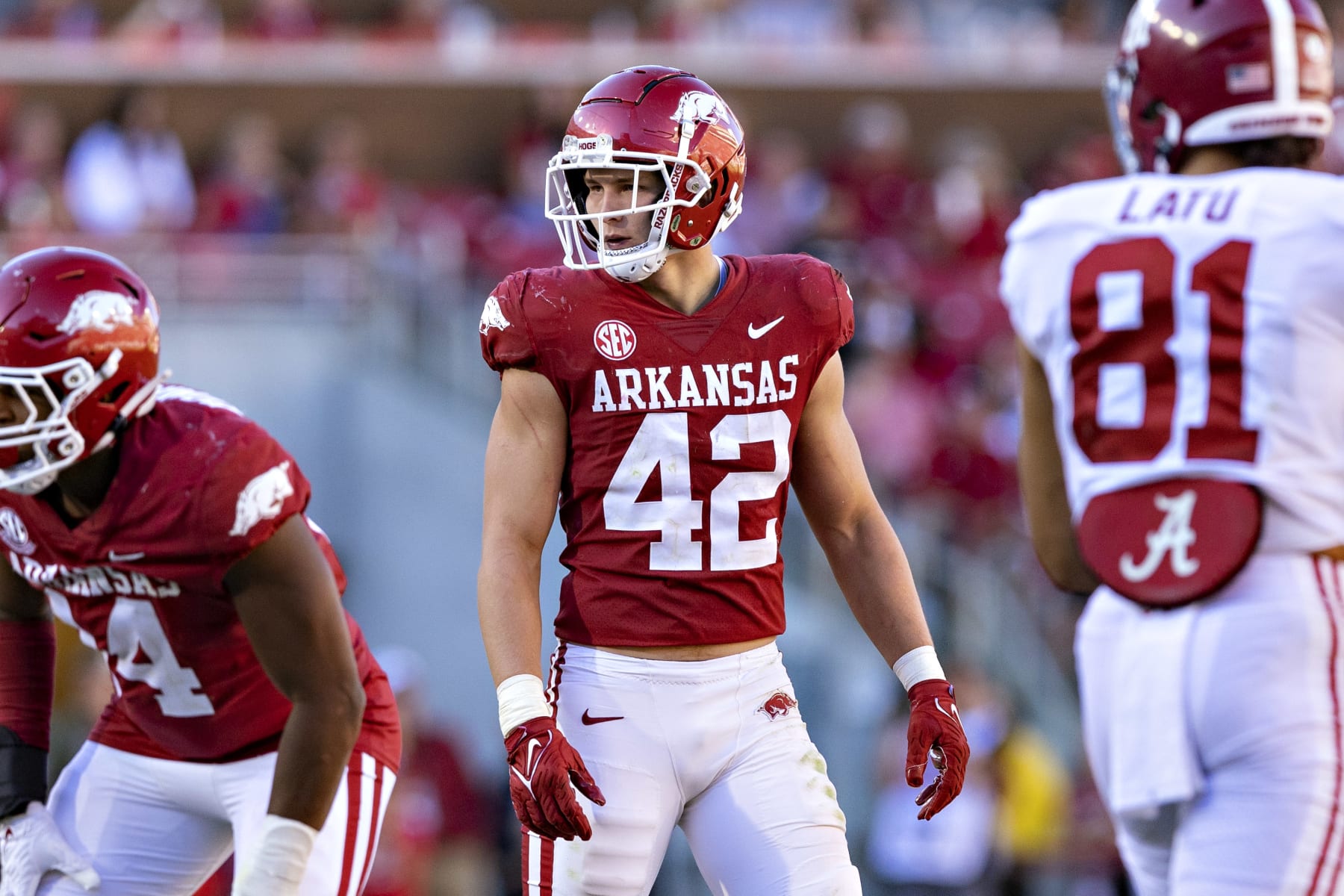 FAYETTEVILLE, ARKANSAS - OCTOBER 1: Drew Sanders #42 of the Arkansas Razorbacks looks over the offense during a game against the Alabama Crimson Tide at Donald W. Reynolds Razorback Stadium on October 1, 2022 in Fayetteville, Arkansas. The Crimson Tide defeated the Razorbacks 49-26. (Photo by Wesley Hitt/Getty Images)