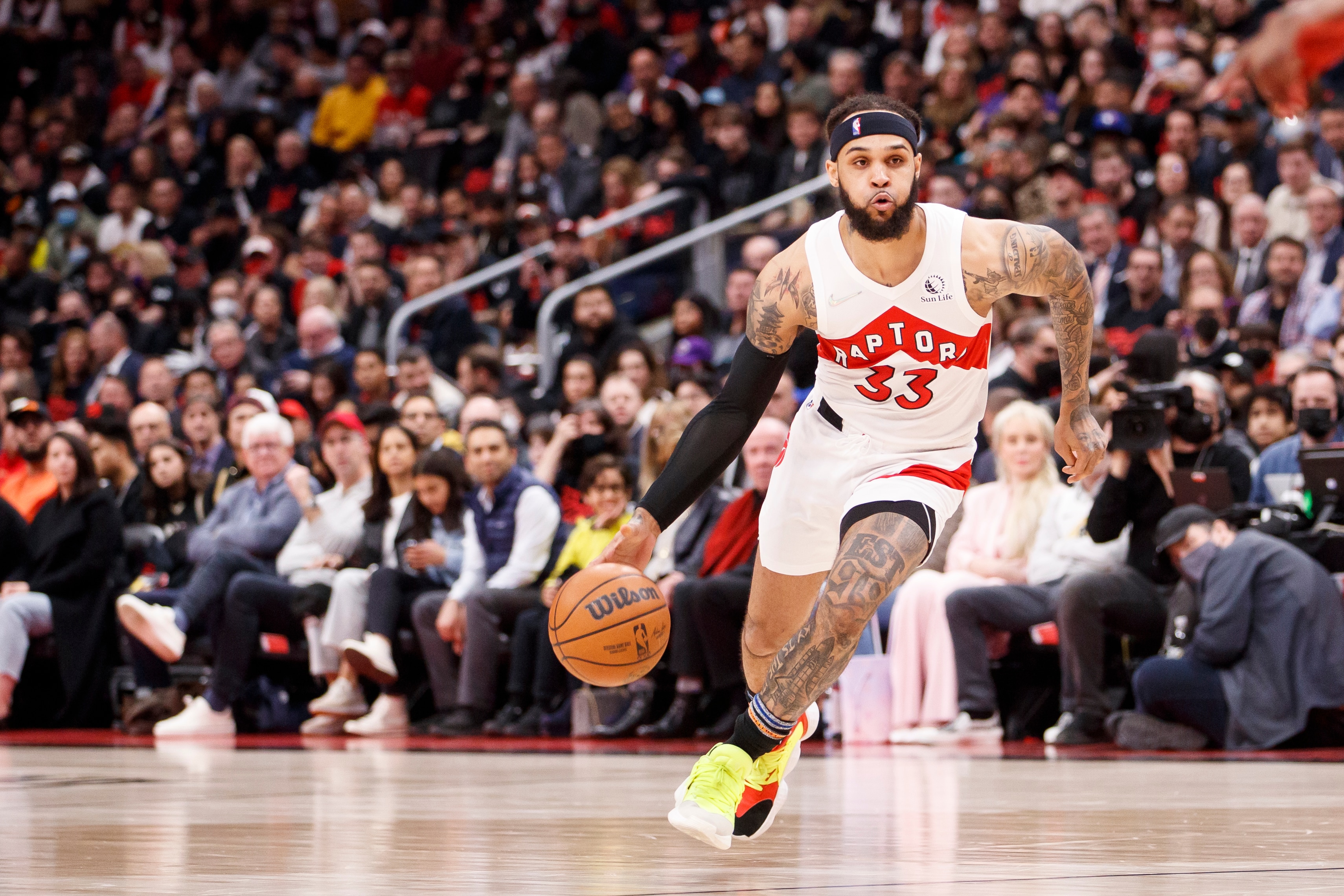 TORONTO, ON - APRIL 28:  Gary Trent Jr. #33 of the Toronto Raptors drives to the net during first half of Game Six of the Eastern Conference First Round against the Philadelphia 76ers at Scotiabank Arena on April 28, 2022 in Toronto, Canada. NOTE TO USER: User expressly acknowledges and agrees that, by downloading and or using this Photograph, user is consenting to the terms and conditions of the Getty Images License Agreement. (Photo by Cole Burston/Getty Images)
