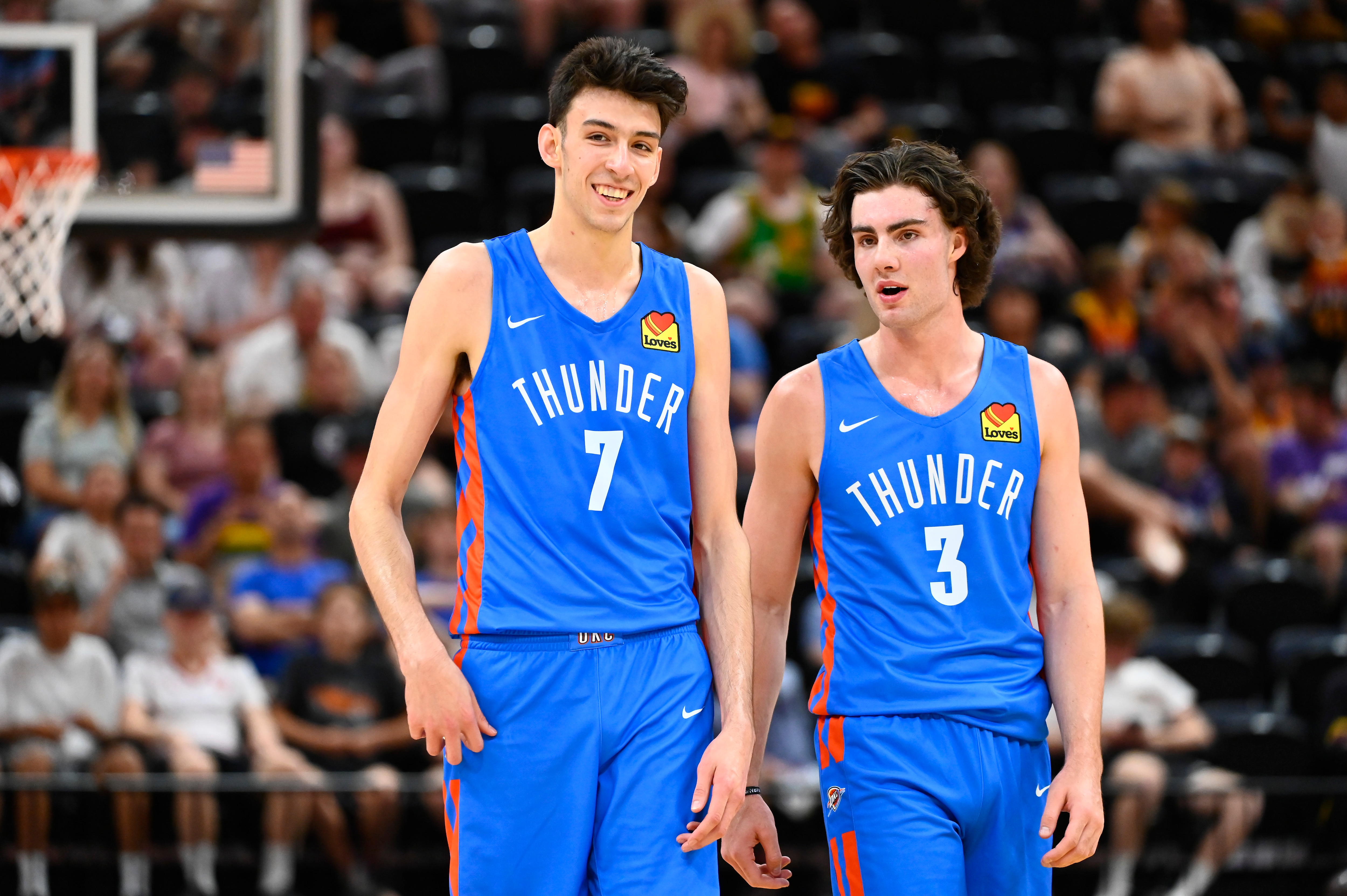SALT LAKE CITY, UTAH - JULY 05: Chet Holmgren #7 of the Oklahoma City Thunder speaks with teammate Josh Giddey #3 during a NBA Summer League game against the Utah Jazz at Vivint Arena on July 05, 2022 in Salt Lake City, Utah. NOTE TO USER: User expressly acknowledges and agrees that, by downloading and/or using this Photograph, user is consenting to the terms and conditions of the Getty Images License Agreement. (Photo by Alex Goodlett/Getty Images)