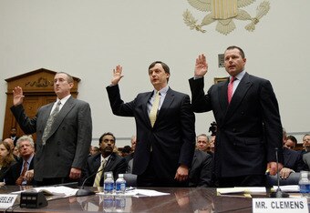 WASHINGTON - FEBRUARY 13:  (L-R) Brian McNamee, former personal trainer, Charlie Scheeler, member of the investigating staff for the Mitchell report and Major League Baseball player Roger Clemens raise their right hands as they are sworn in during a House