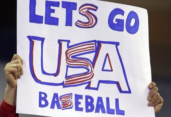 TORONTO - MARCH 11:  A fan cheers on the USA team during the 2009 World Baseball Classic Pool C match at the Rogers Centre March 11, 2009 in Toronto, Ontario, Canada. Venezuela defeated the USA 5-3.  (Photo by Elsa/Getty Images)