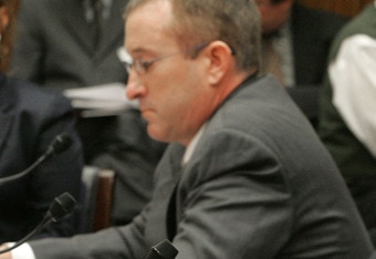 WASHINGTON - FEBRUARY 13:  Major League Baseball player Roger Clemens (R) testifies while Brian McNamee (L), sits nearby during a House Oversight and Government Reform Committee, February 13, 2008 in Washington DC. The committee is hearing testimony on th