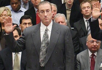 WASHINGTON - FEBRUARY 13:  Major League Baseball pitcher Roger Clemens (R), Charlie Scheeler, investigator on former Sen. George Mitchell's staff (C) and and former Major League Baseball strength and conditioning coach Brian McNamee (L) raise their right 