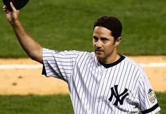 NEW YORK - SEPTEMBER 18:  Mike Mussina #35 of the New York Yankees waves to the crowd after being taken out of the game in the seventh inning against the Chicago White Sox on September 18, 2008 at Yankee Stadium in the Bronx borough of New York City.  (Ph