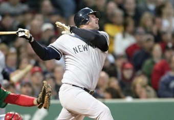 BOSTON - APRIL 20: Jason Giambi #25 of the New York Yankees swings at the pitch against the Boston Red Sox on April 20, 2007 at Fenway Park in Boston, Massachusetts. (Photo by Elsa/Getty Images)