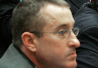 WASHINGTON - FEBRUARY 13:  Major League Baseball player Roger Clemens (R) talks with his attorney Rusty Hardin (L) while Brian McNamee (C), former trainer, sits nearby during a House Oversight and Government Reform Committee hearing February 13, 2008 in W