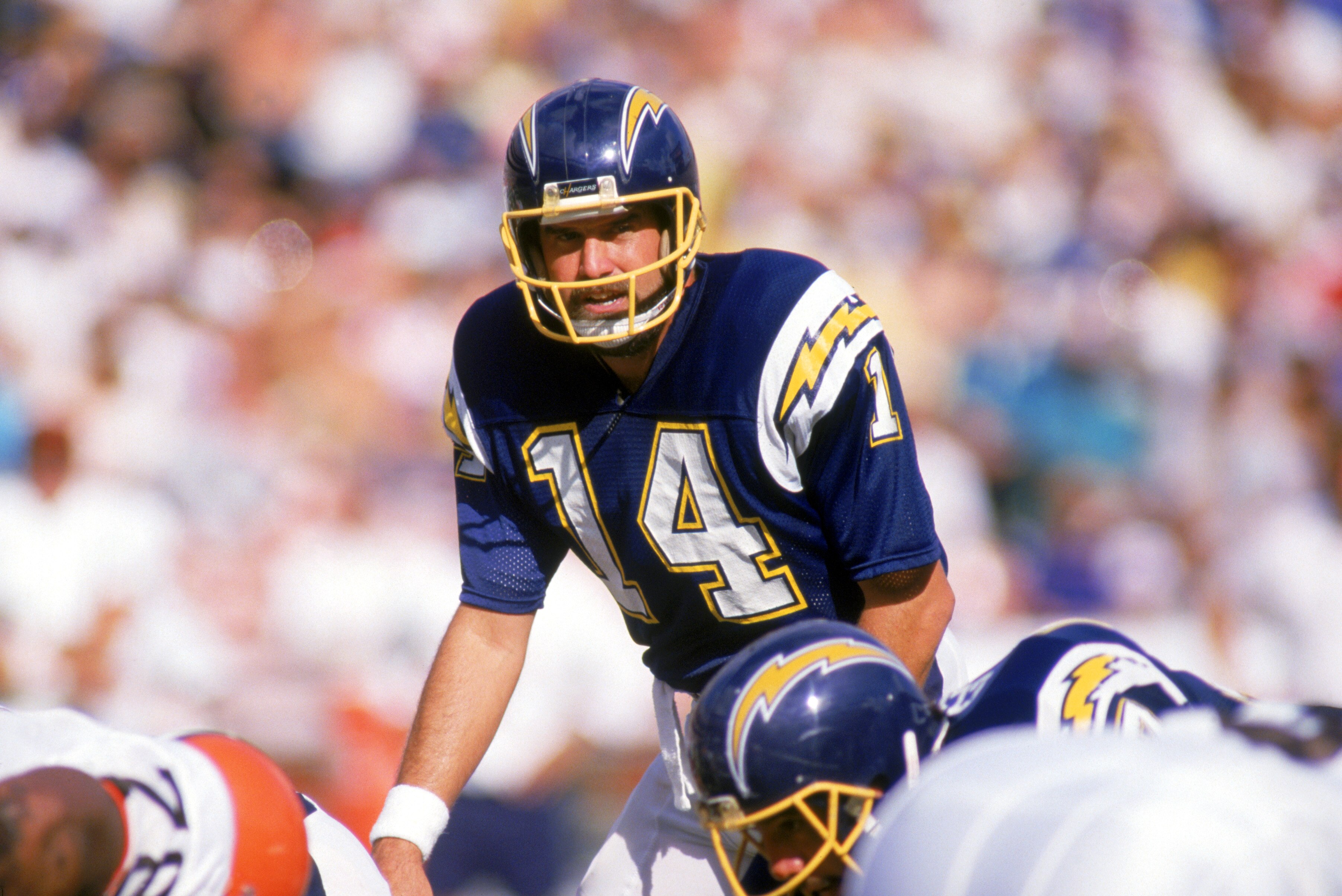 SAN DIEGO -1987: Dan Fouts #14 of the San Diego Chargers stands at the line of scrimmage during the 1987 NFL season game against the Cleveland Browns at Jack Murphy Stadium in San Diego, California. ( Photo by: Stephen Dunn/Getty Images)