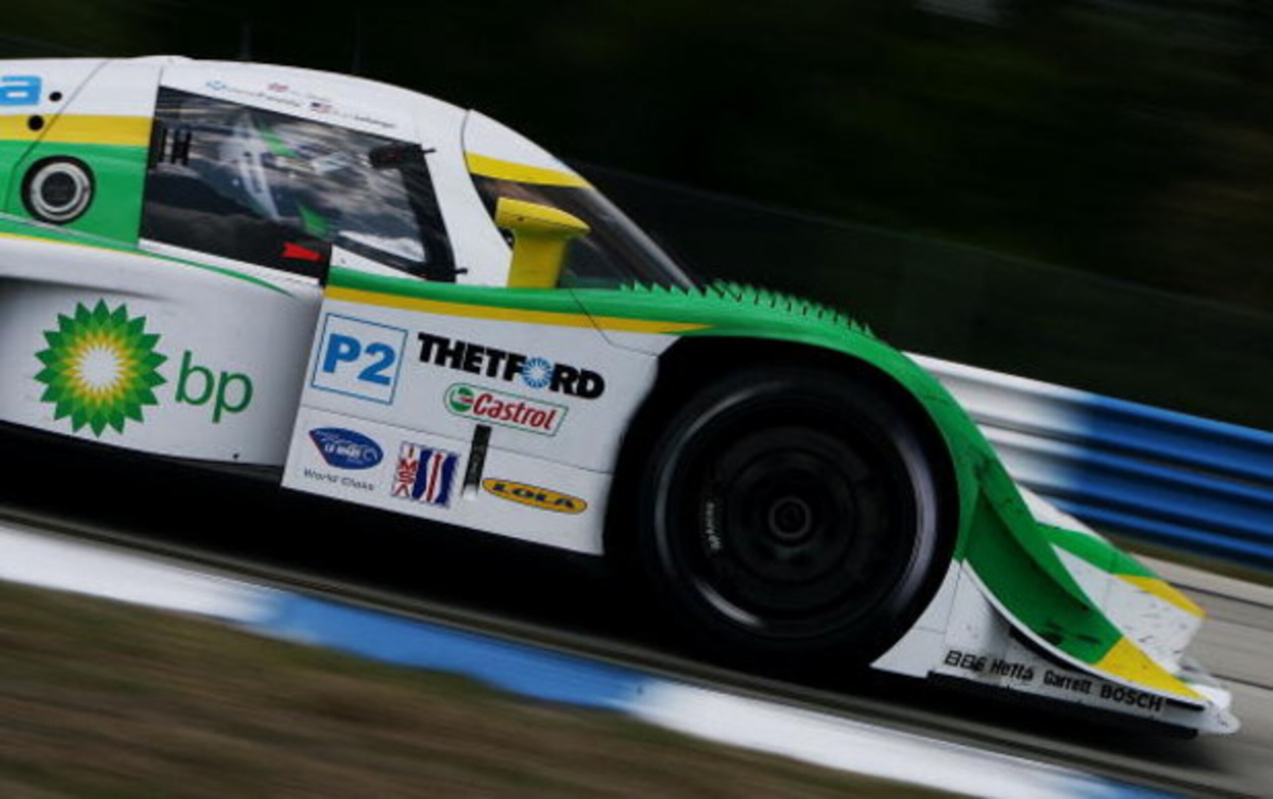 SEBRING, FL - MARCH 21:  Marino Franchitti driver of the #20 Dyson Racing Team Mazda Lola B08 86 gets through turn eight during the 57th Annual Mobil1 12 Hours of Sebring at Sebring International Raceway on March 21, 2009 in Sebring, Florida.  (Photo by D