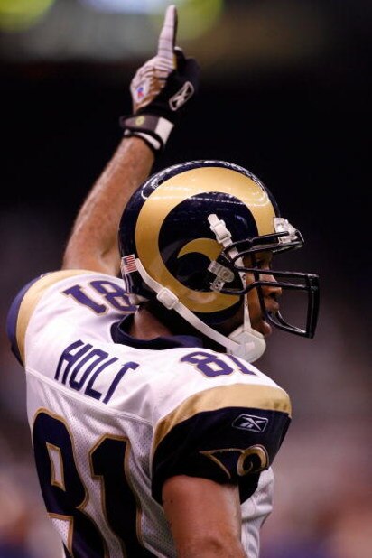 NEW ORLEANS - NOVEMBER 11: Torry Holt #81 of the St. Louis Rams celebrates after a touchdown by Randy McMichael #84 against the New Orleans Saints on November 11, 2007 at the Louisiana Superdome in New Orleans, Louisiana. The Rams defeated the Saints 37- NEW ORLEANS - NOVEMBER 11: Torry Holt #81 of the St. Louis Rams celebrates after a touchdown by Randy McMichael #84 against the New Orleans Saints on November 11, 2007 at the Louisiana Superdome in New Orleans, Louisiana. The Rams defeated the Saints 37-