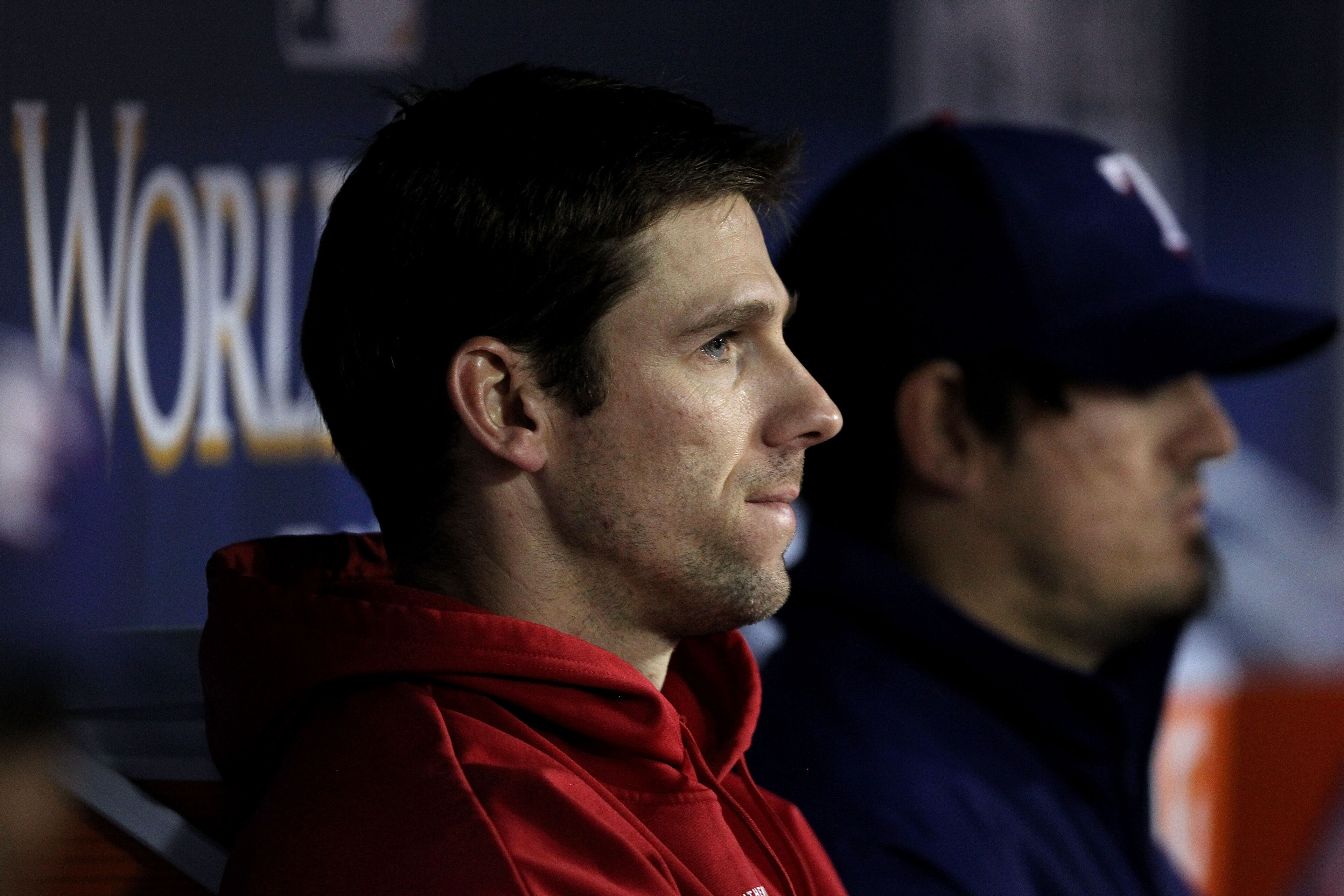 ARLINGTON, TX - NOVEMBER 01: Losing pitcher Cliff Lee #33 of the Texas Rangers looks on from the dugout against the San Francisco Giants in Game Five of the 2010 MLB World Series at Rangers Ballpark in Arlington on November 1, 2010 in Arlington, Texas. ARLINGTON, TX - NOVEMBER 01: Losing pitcher Cliff Lee #33 of the Texas Rangers looks on from the dugout against the San Francisco Giants in Game Five of the 2010 MLB World Series at Rangers Ballpark in Arlington on November 1, 2010 in Arlington, Texas.