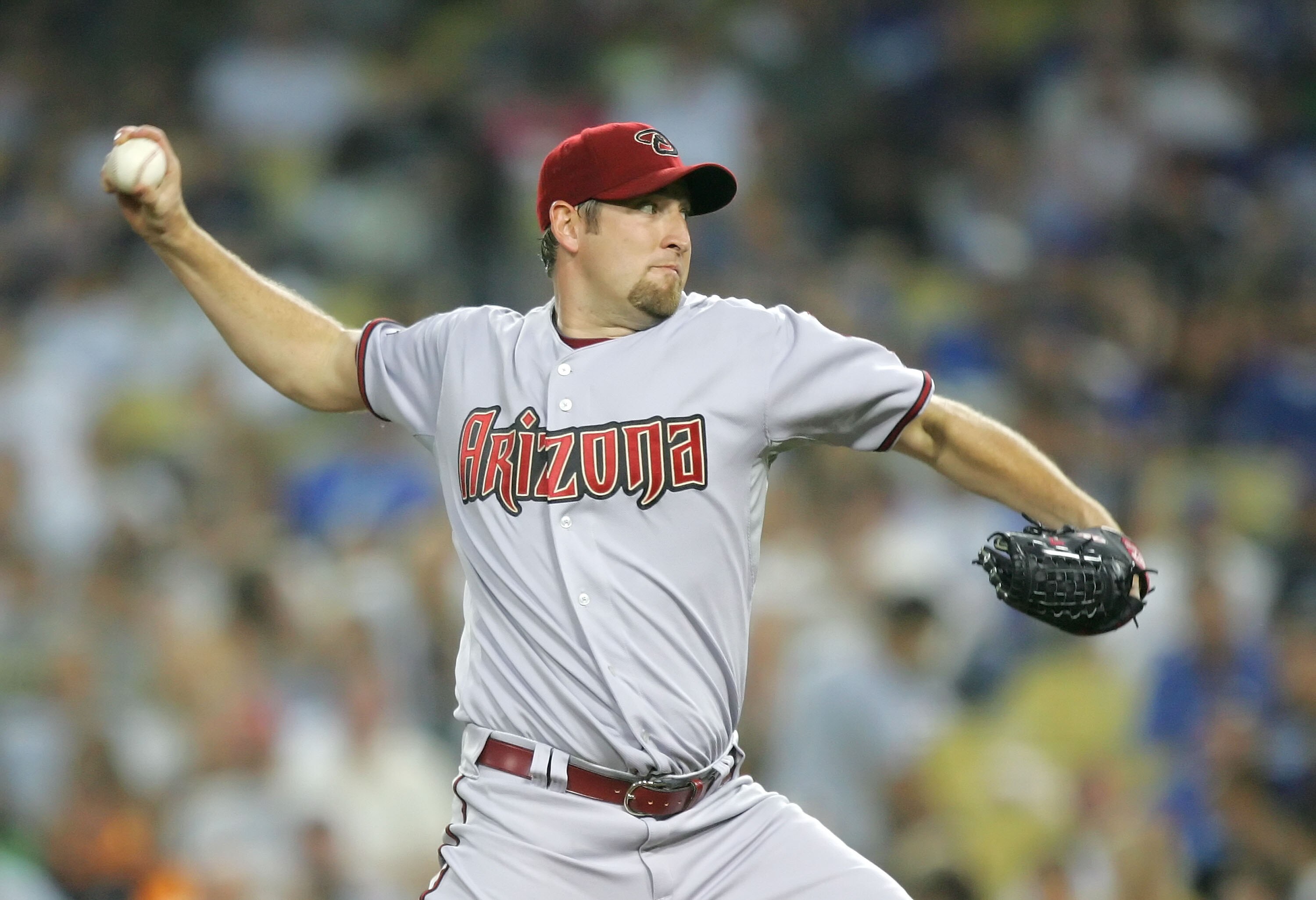 LOS ANGELES - JULY 31:   Brandon Webb #17 of the Arizona Diamondbacks pitches against the Los Angeles Dodgers at Dodger Stadium on July 31, 2008 in Los Angeles, California.  (Photo by Lisa Blumenfeld/Getty Images)