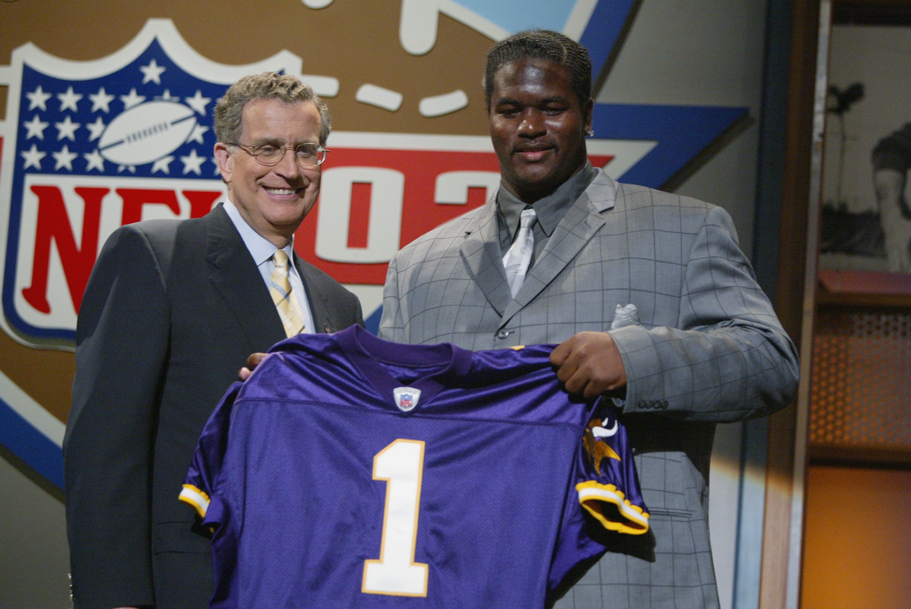 NEW YORK - APRIL 20:  Bryant McKinnie of Miami stands with NFL Commisioner Paul Tagliabue after being selected as the seventh player in the NFL draft by the Minnesota Vikings at the Theatre in Madison Square Garden in New York City, New York on April 20,
