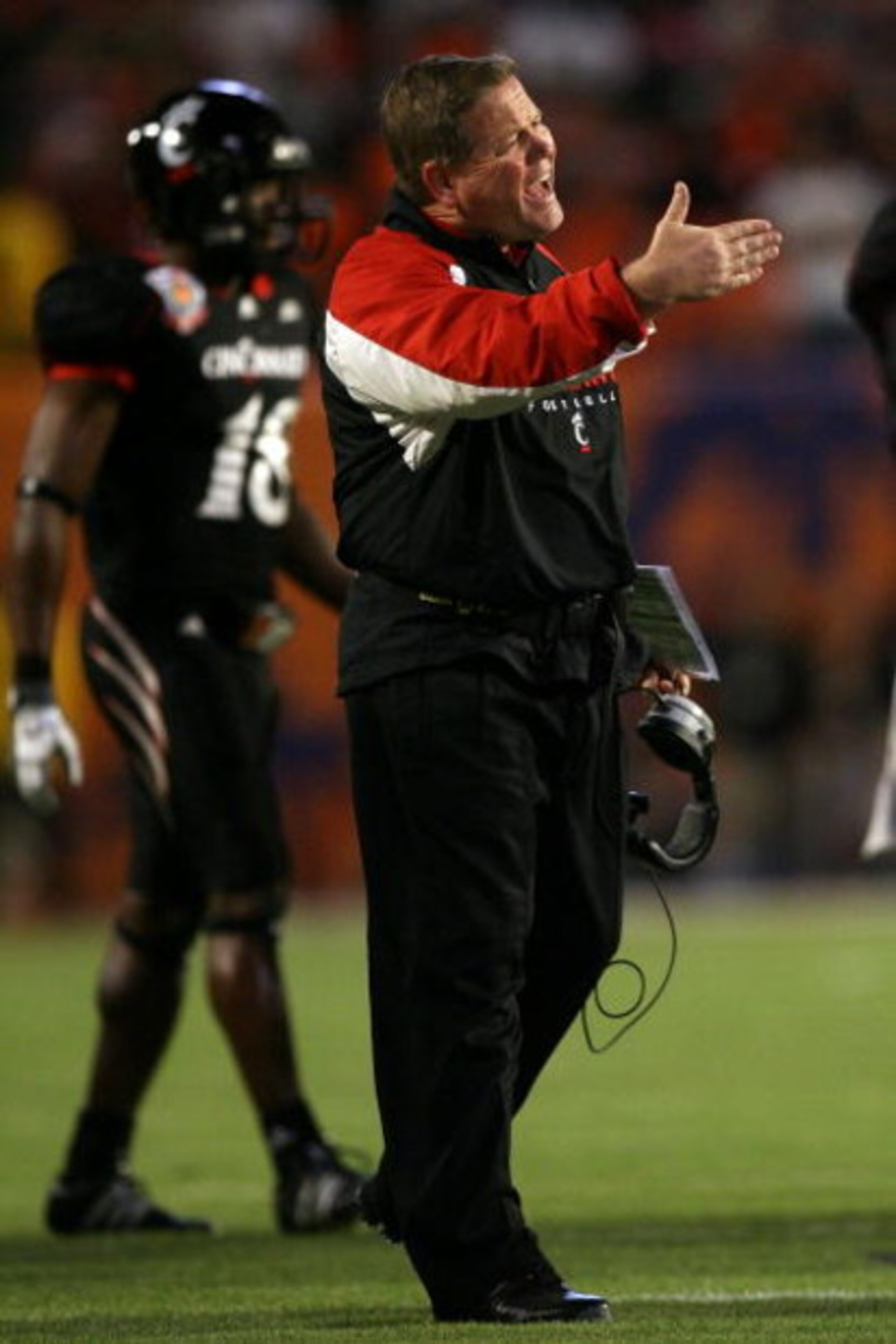 MIAMI - JANUARY 01:  Head coach Brian Kelly of the Cincinnati Bearcats shouts on the field against the Virginia Tech Hokies during the FedEx Orange Bowl at Dolphin Stadium on January 1, 2009 in Miami, Florida.  (Photo by Doug Benc/Getty Images)