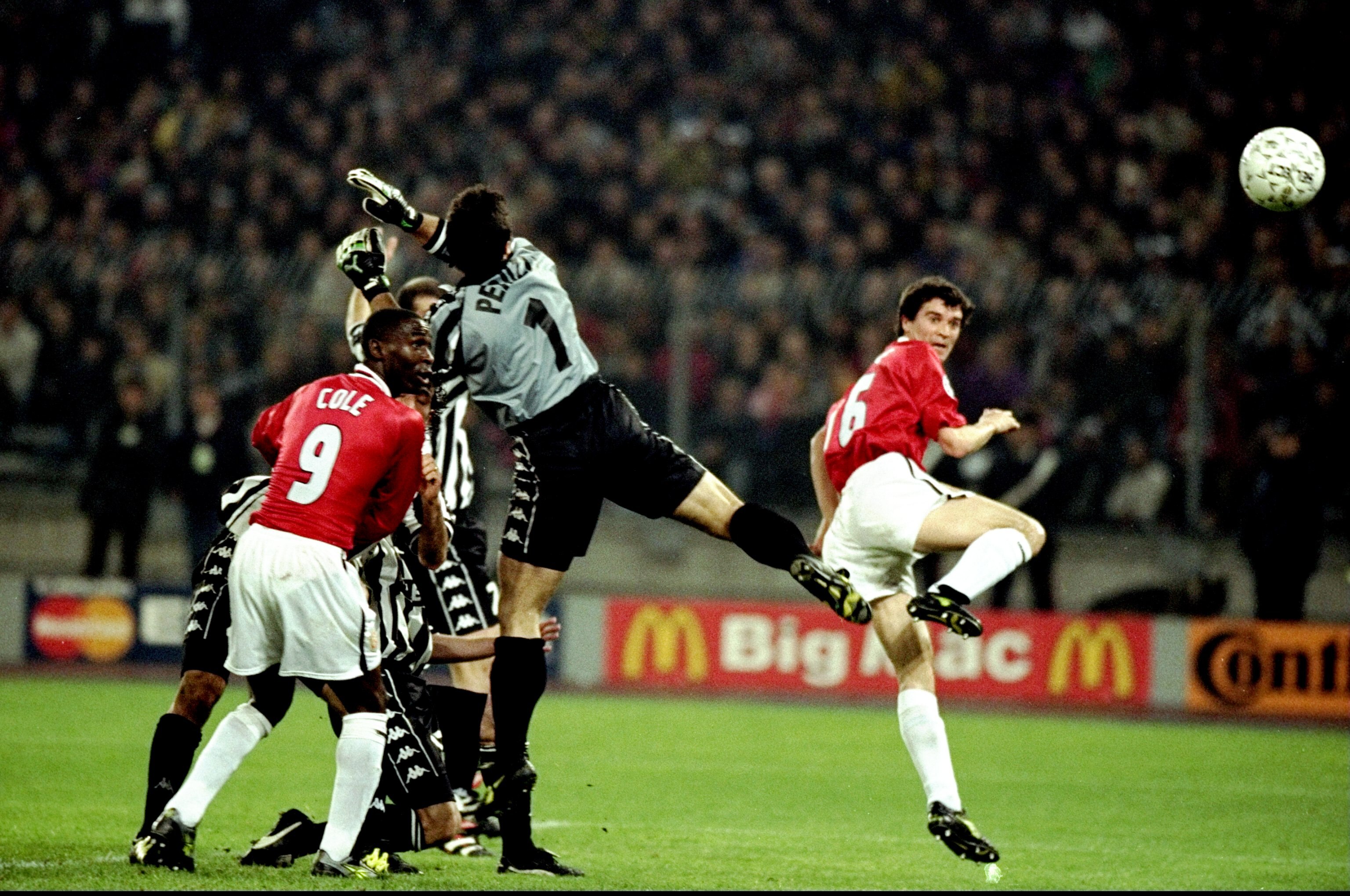 21 Apr 1999:  Manchester United captain Roy Keane gets infront of Juventus keeper Angelo Peruzzi to head home during the UEFA Champions League semi-final second leg match at the Stadio delle Alpi in Turin, Italy. United won 3-2 on the night to go through4