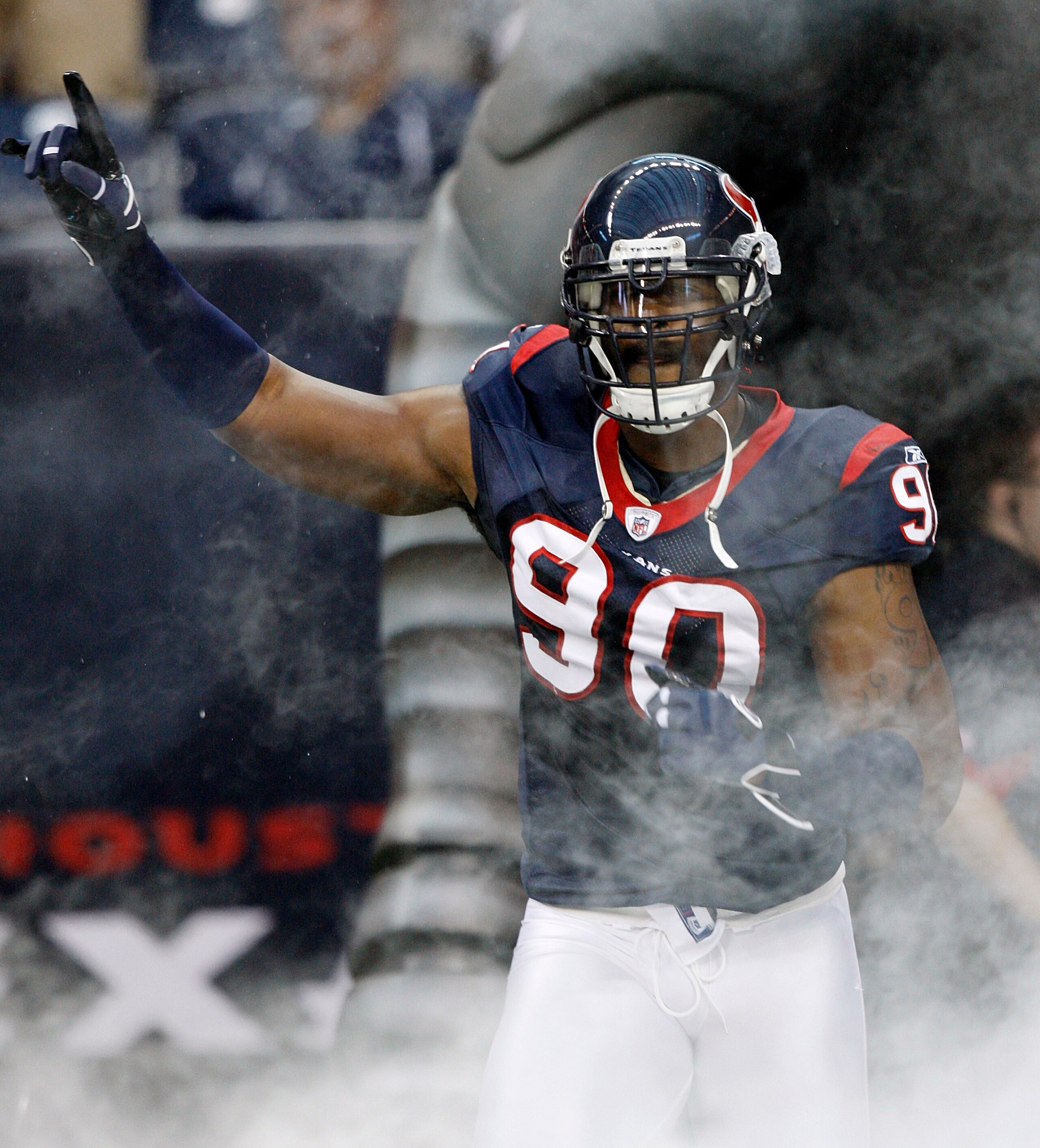 HOUSTON - AUGUST 28: Defensive end Mario Williams #90 of the Houston Texans is introduced before a preseason game against the Dallas Cowoys at Reliant Stadium on August 28, 2010 in Houston, Texas. (Photo by Bob Levey/Getty Images) HOUSTON - AUGUST 28: Defensive end Mario Williams #90 of the Houston Texans is introduced before a preseason game against the Dallas Cowoys at Reliant Stadium on August 28, 2010 in Houston, Texas. (Photo by Bob Levey/Getty Images)