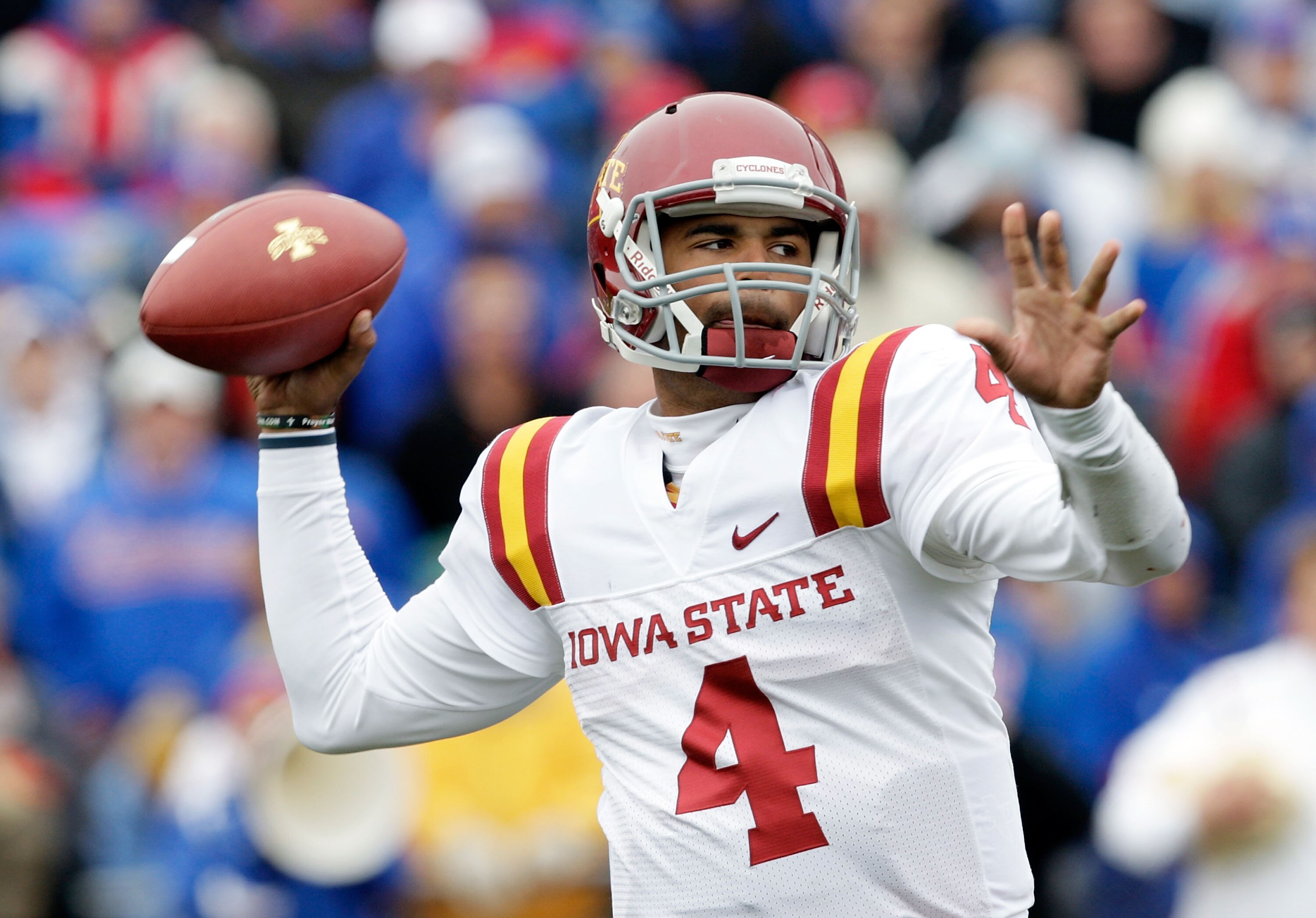 LAWRENCE, KS - OCTOBER 10:  Quarterback Austen Arnaud #4 of the Iowa State Cyclones passes during the game against the Kansas Jayhawks on October 10, 2009 at Memorial Stadium in Lawrence, Kansas.  (Photo by Jamie Squire/Getty Images)