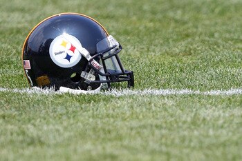 LATROBE, PA - JULY 29:  A Pittsburgh Steelers helmet sits on the practice field during training camp on July 29, 2011 at St Vincent College in Latrobe, Pennsylvania.  (Photo by Jared Wickerham/Getty Images)