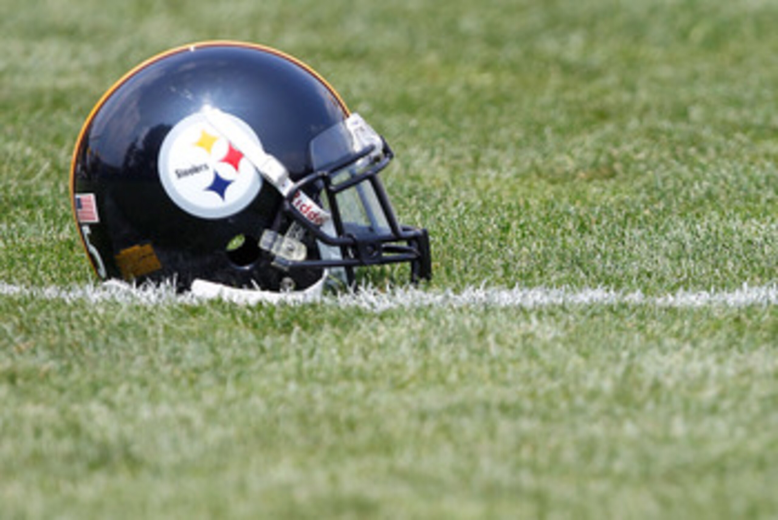 LATROBE, PA - JULY 29:  A Pittsburgh Steelers helmet sits on the practice field during training camp on July 29, 2011 at St Vincent College in Latrobe, Pennsylvania.  (Photo by Jared Wickerham/Getty Images)