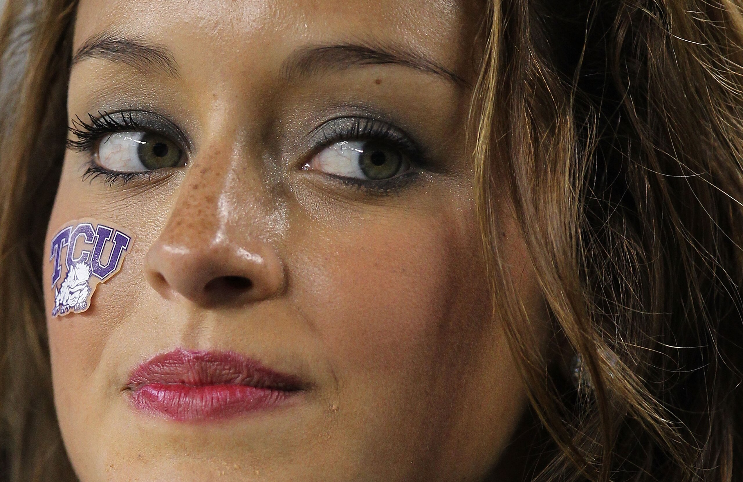 ARLINGTON, TX - SEPTEMBER 04:  A TCU Horned Frogs cheerleader during a game against the Oregon State Beavers at Cowboys Stadium on September 4, 2010 in Arlington, Texas.  (Photo by Ronald Martinez/Getty Images)