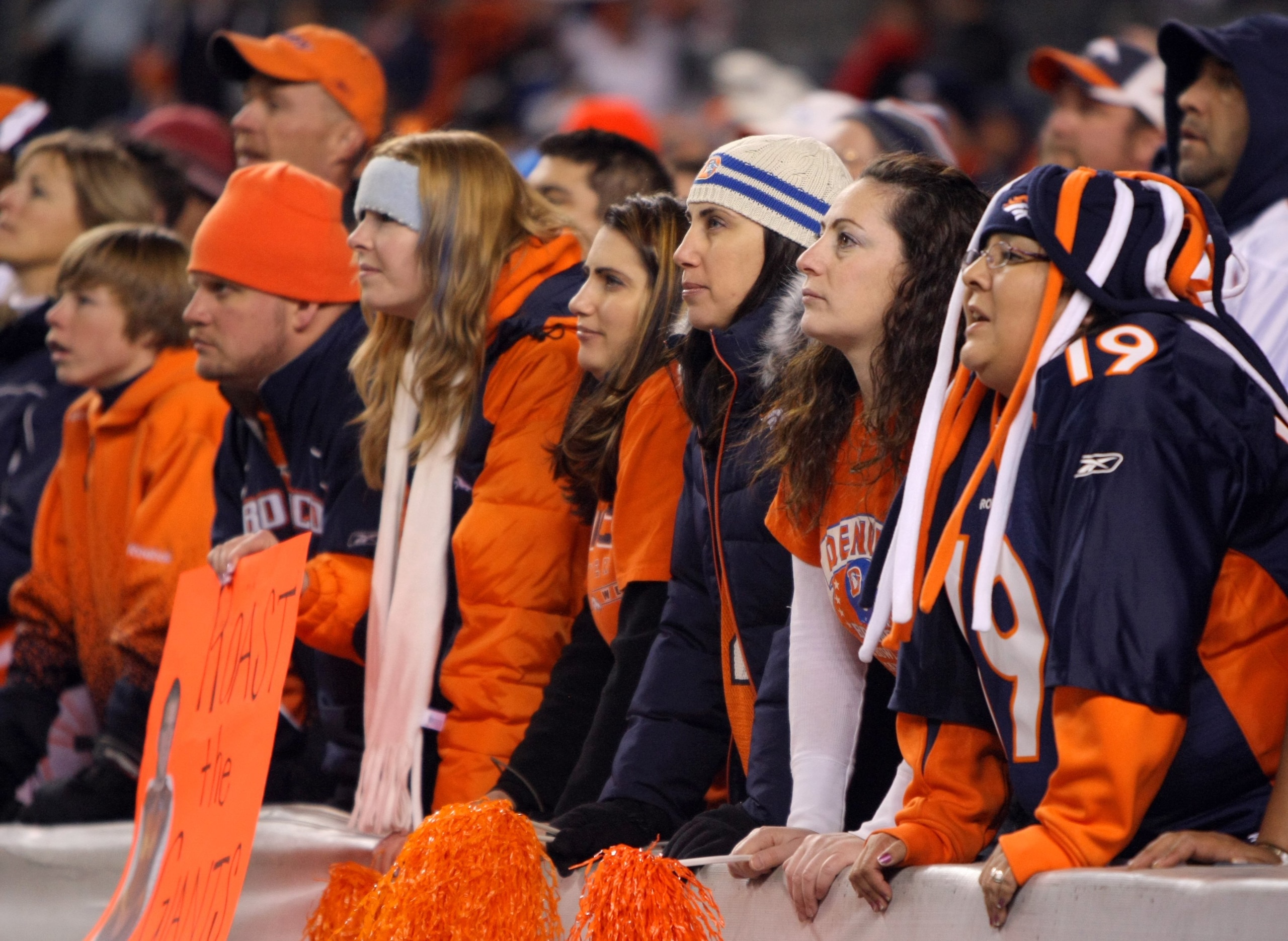 DENVER - NOVEMBER 26:  Denver Broncos fans look on during the NFL game between the New York Giants and the Denver Broncos at Invesco Field at Mile High on November 26, 2009 in Denver, Colorado. The Broncos defeated the Giants 26-6. (Photo by Doug Pensinge