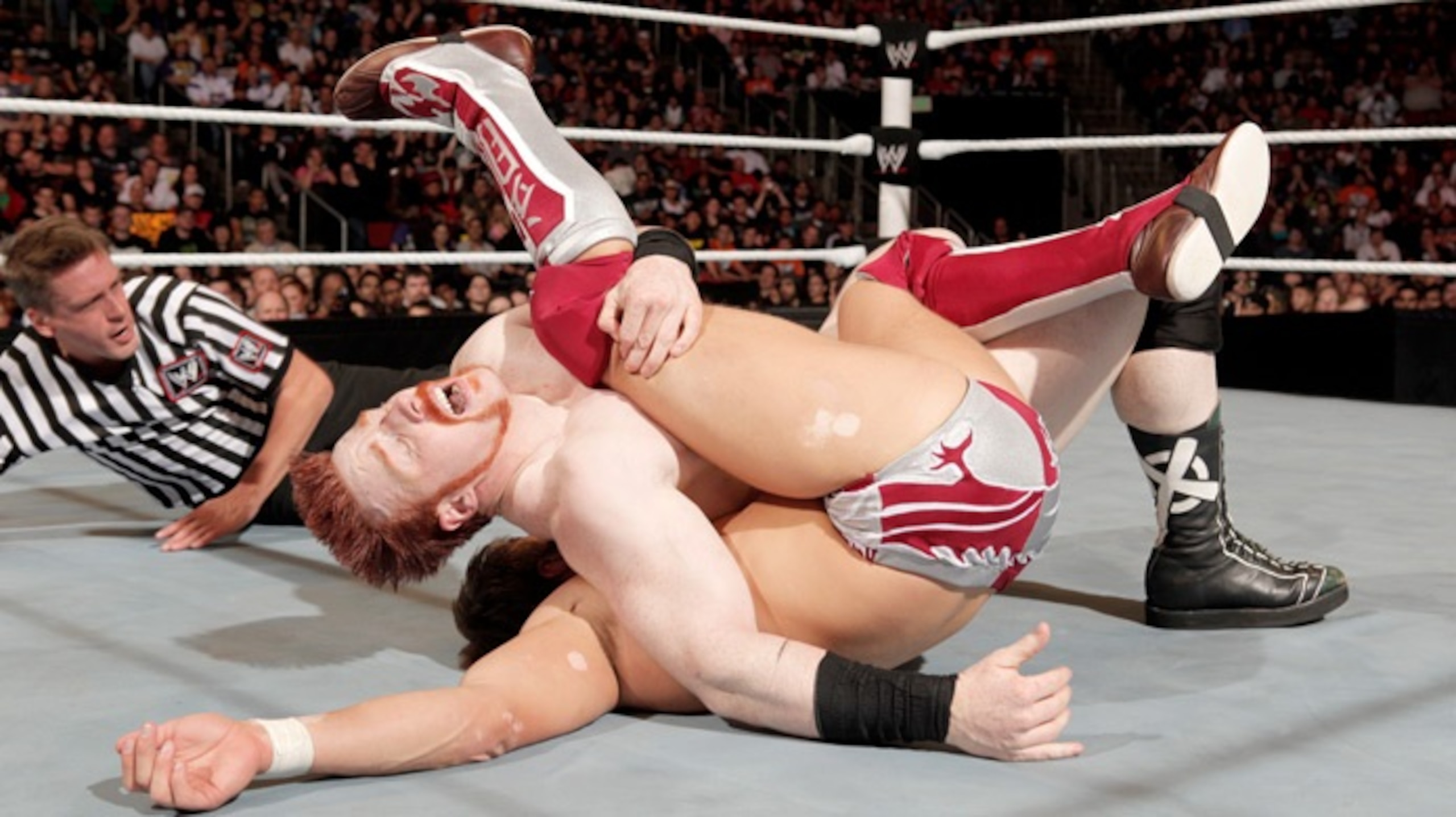 Sheamus securing a pinfall on his WrestleMania XXVII opponent, Daniel Bryan.