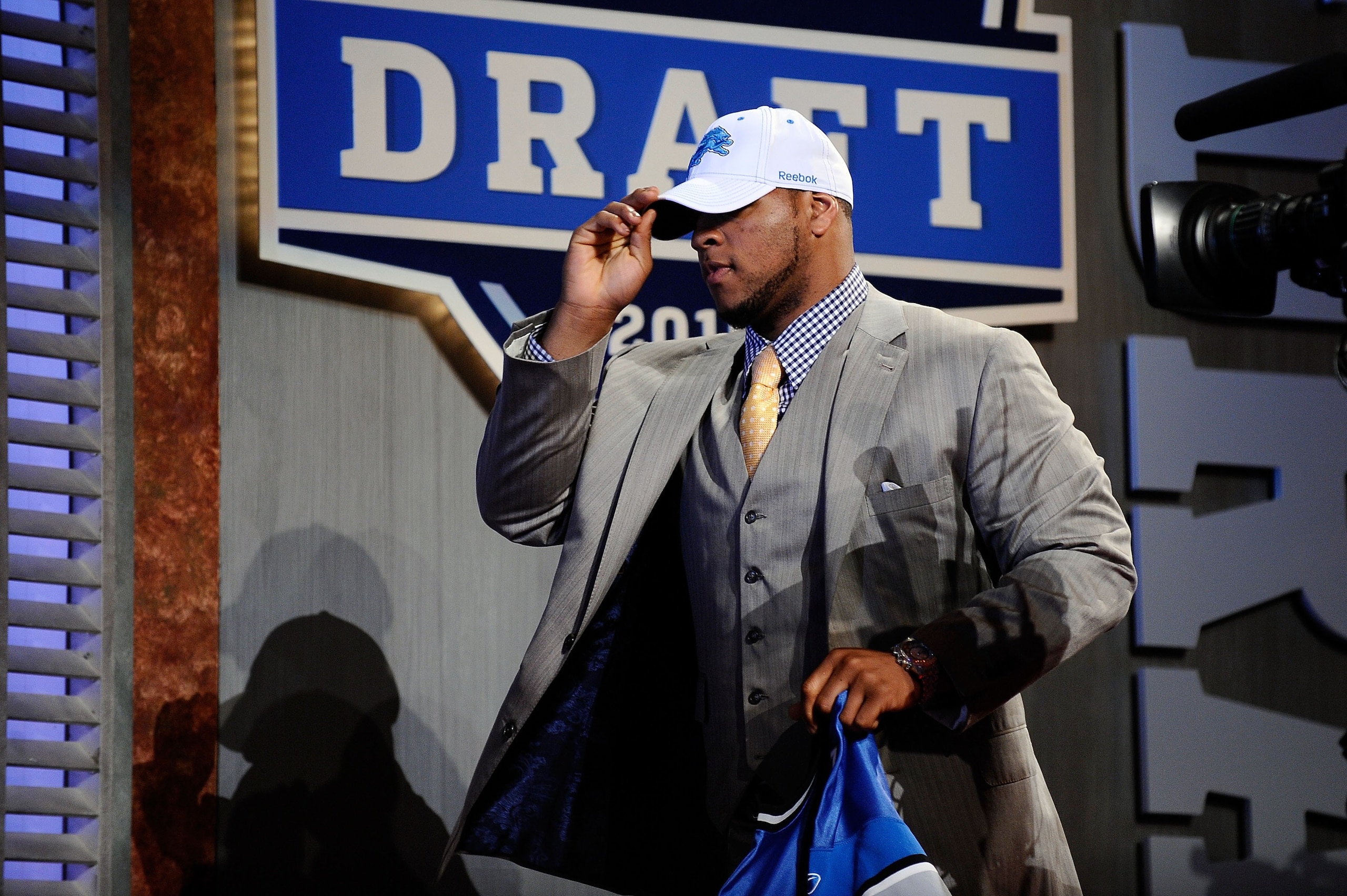 NEW YORK - APRIL 22:  Ndamukong Suh of the Nebraska Cornhuskers walks on stage after he was selected by the Detroit Lions number 2 overall during the first round of the 2010 NFL Draft at Radio City Music Hall on April 22, 2010 in New York City.  (Photo by