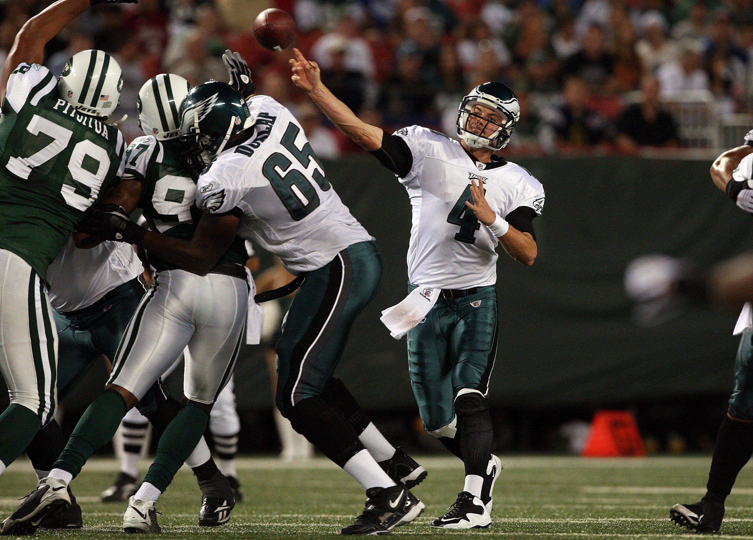 EAST RUTHERFORD, NJ - SEPTEMBER 3: Quarterback Kevin Kolb #4 of the Philadelphia Eagles passes the ball in the first quarter against the New York Jets during the NFL preseason game at Giants Stadium on September 3, 2009 in East Rutherford, New Jersey. (Ph