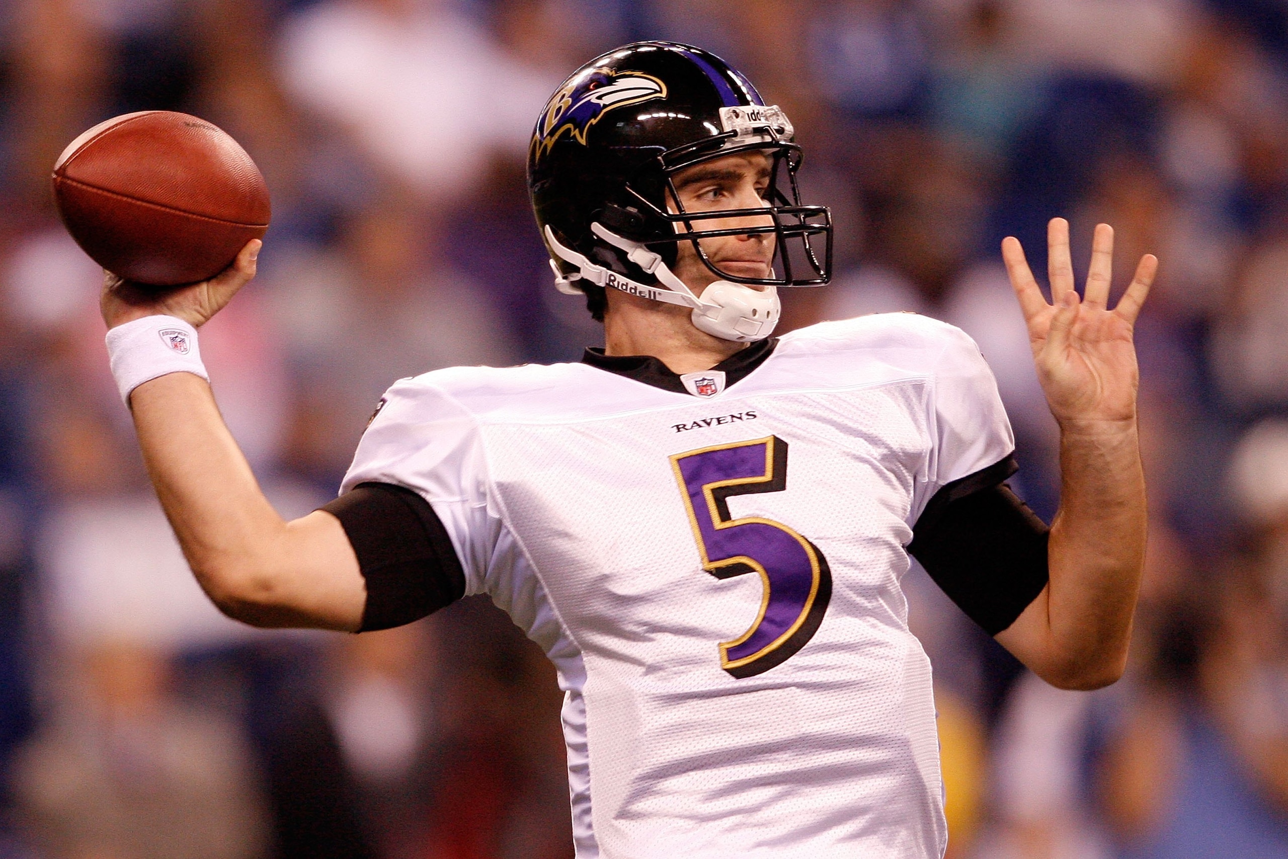 INDIANAPOLIS - JANUARY 16:  Quarterback Joe Flacco #5 of the Baltimore Ravens throws the ball against the Indianapolis Colts in the AFC Divisional Playoff Game at Lucas Oli Stadium on January 16, 2010 in Indianapolis, Indiana.  (Photo by Andy Lyons/Getty