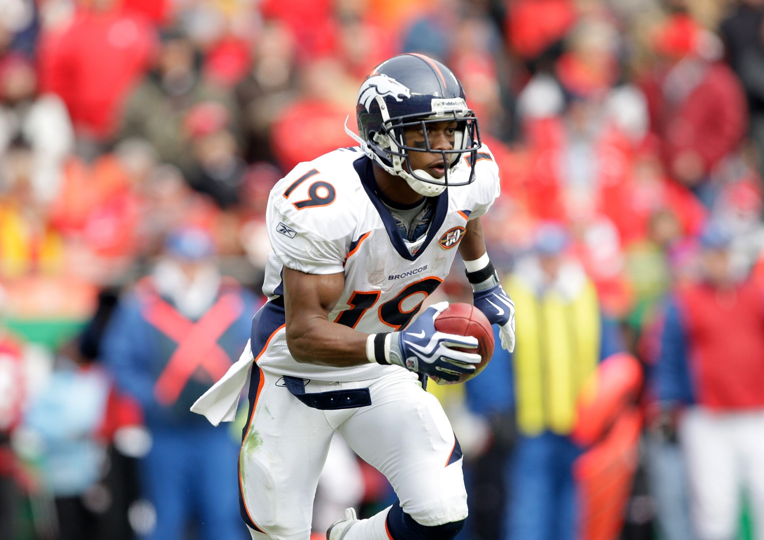 KANSAS CITY, MO - DECEMBER 6:  Eddie Royal #19 of the Denver Broncos runs with the ball for yardage during their NFL game against the Kansas City Chiefs on December 6, 2009 at Arrowhead Stadium in Kansas City, Missouri. The Broncos defeated the Chiefs 44-