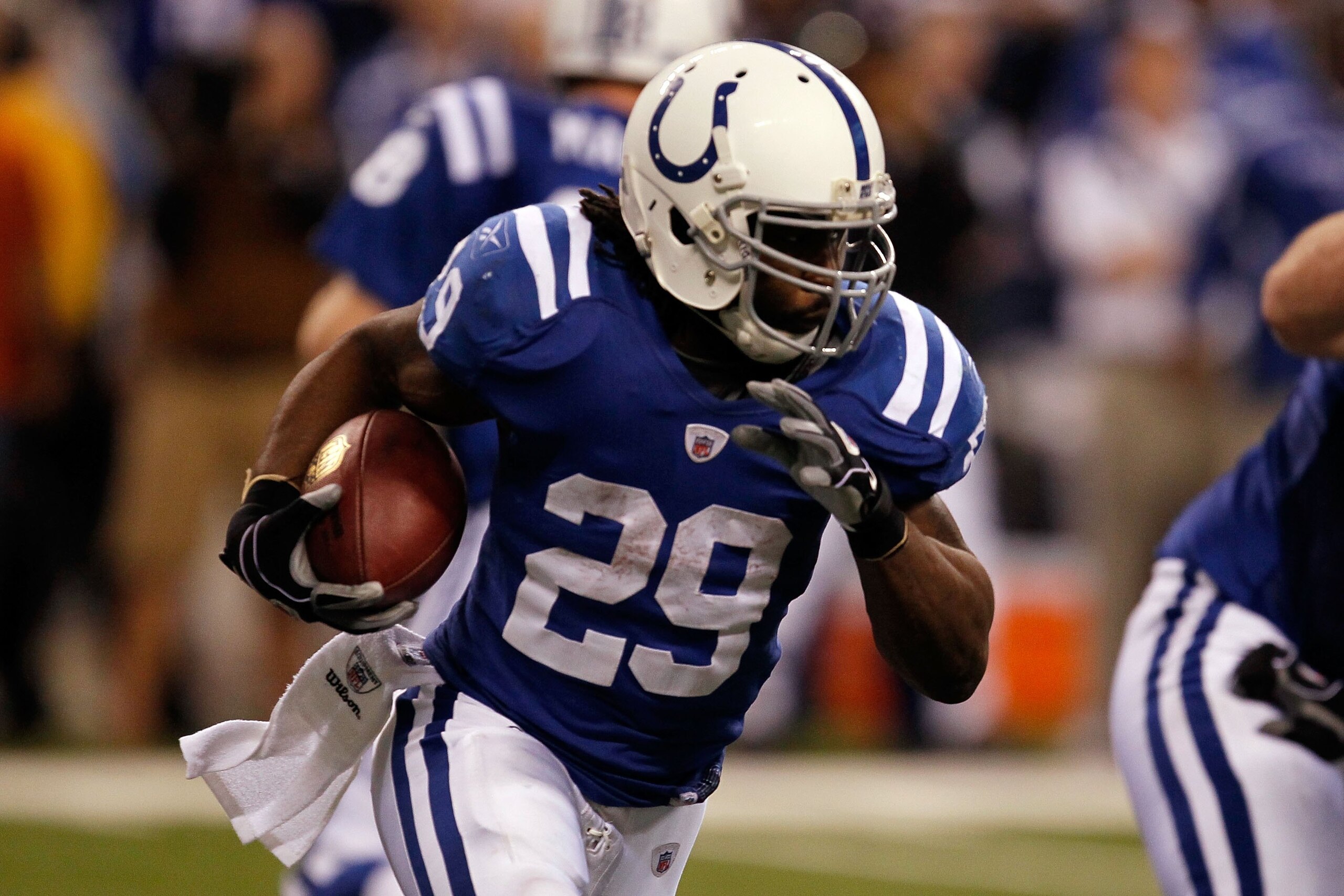 INDIANAPOLIS - JANUARY 24:  Running back Joseph Addai #29 of the Indianapolis Colts runs the ball against the New York Jets during the AFC Championship Game at Lucas Oil Stadium on January 24, 2010 in Indianapolis, Indiana. The Colts defeated the Jets 30-