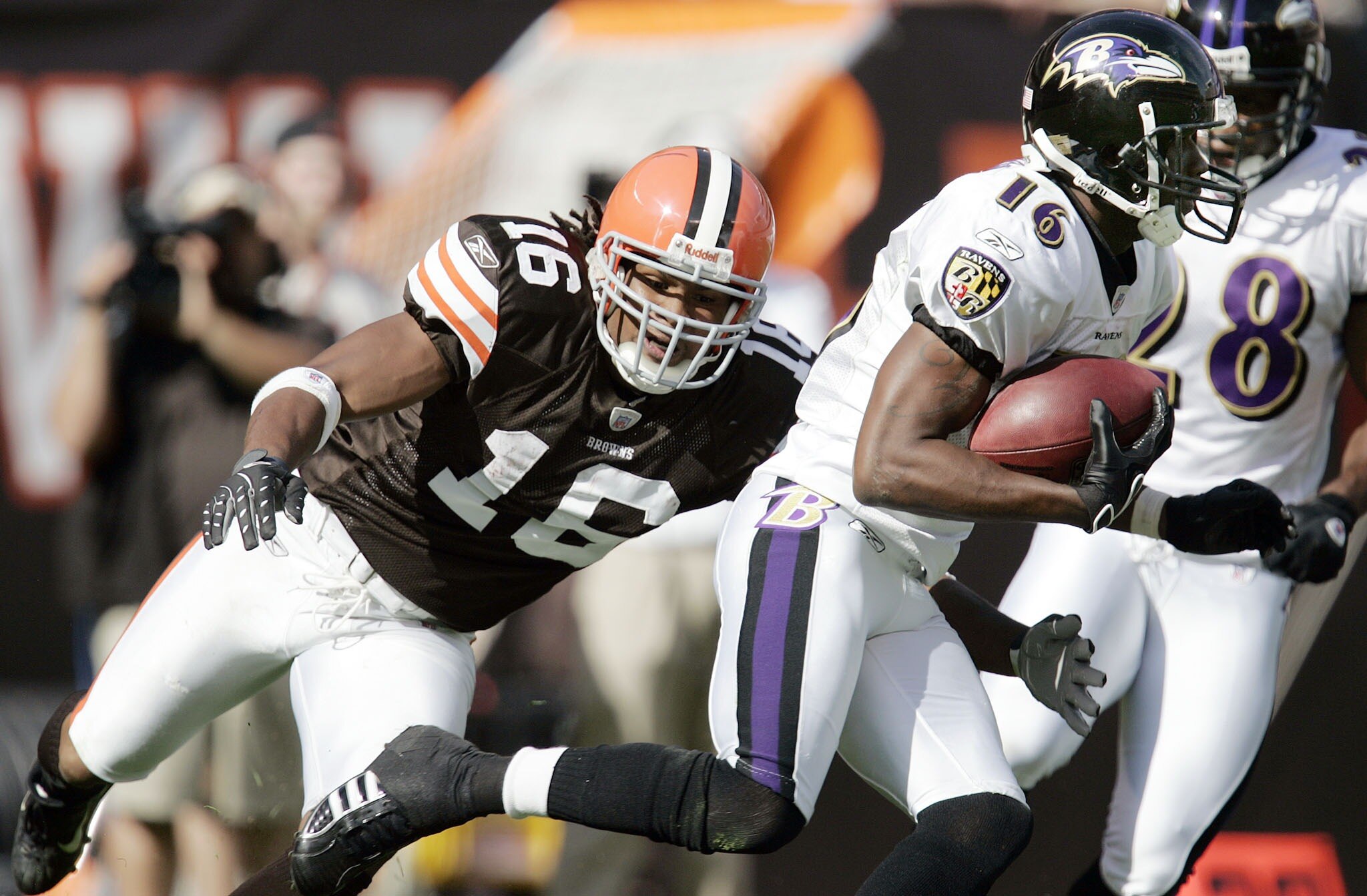 CLEVELAND - SEPTEMBER 30:  Joshua Cribbs #16 of the Cleveland Browns makes a diving tackle against Yamon Figurs #16 of the Baltimore Ravens on a fourth quarter punt return at Cleveland Browns Stadium September 30, 2007 in Cleveland, Ohio. The Browns defea